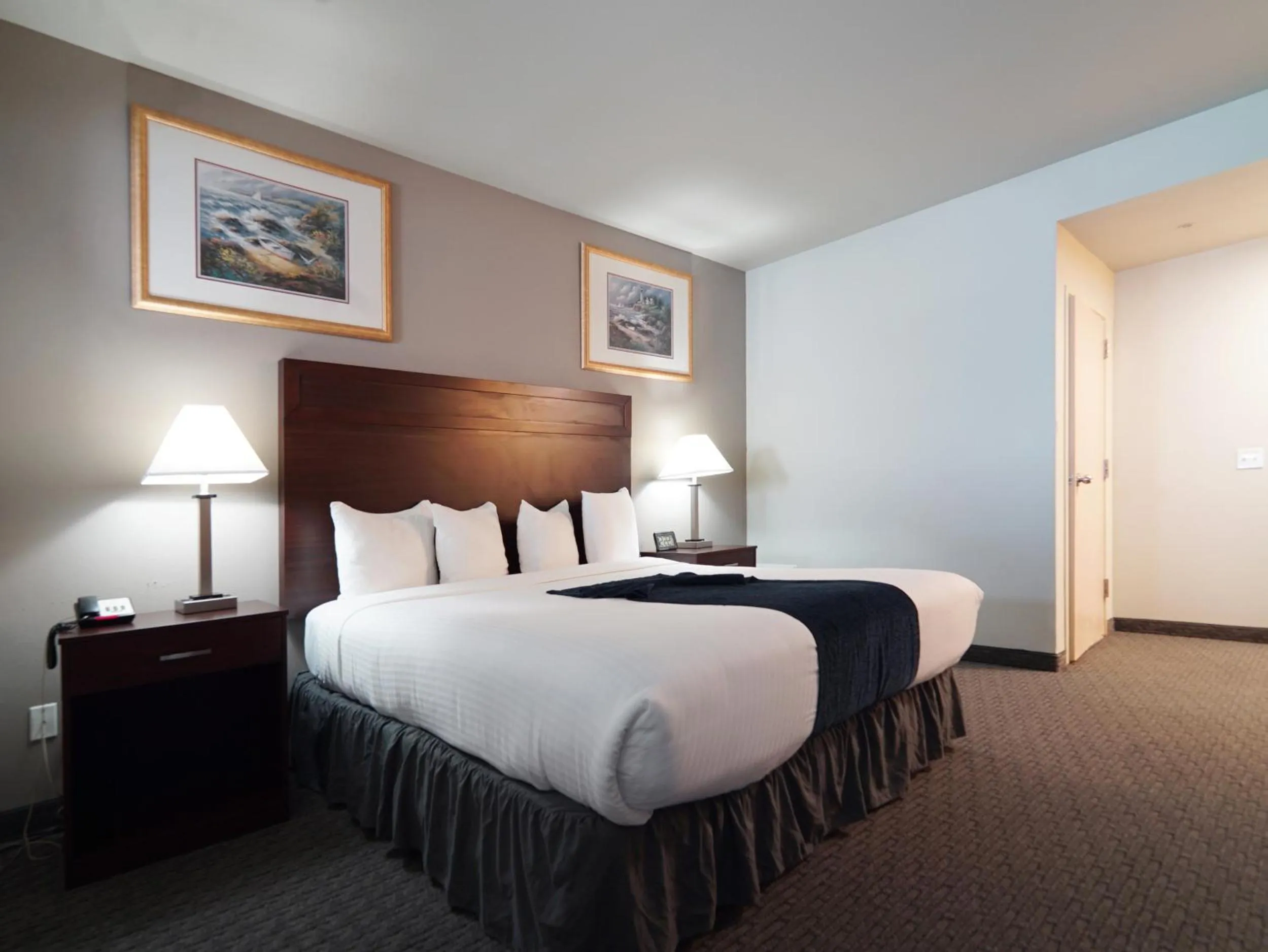 Bed in BayVue Hotel, Resort & Suites