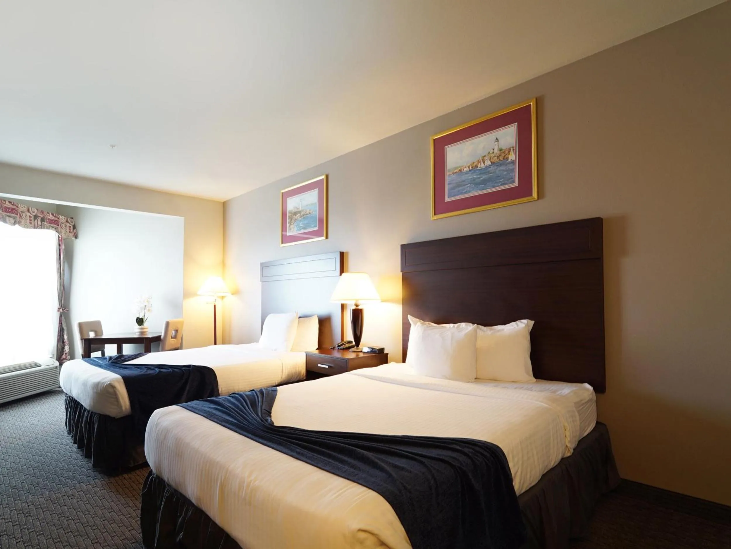 Bed in BayVue Hotel, Resort & Suites