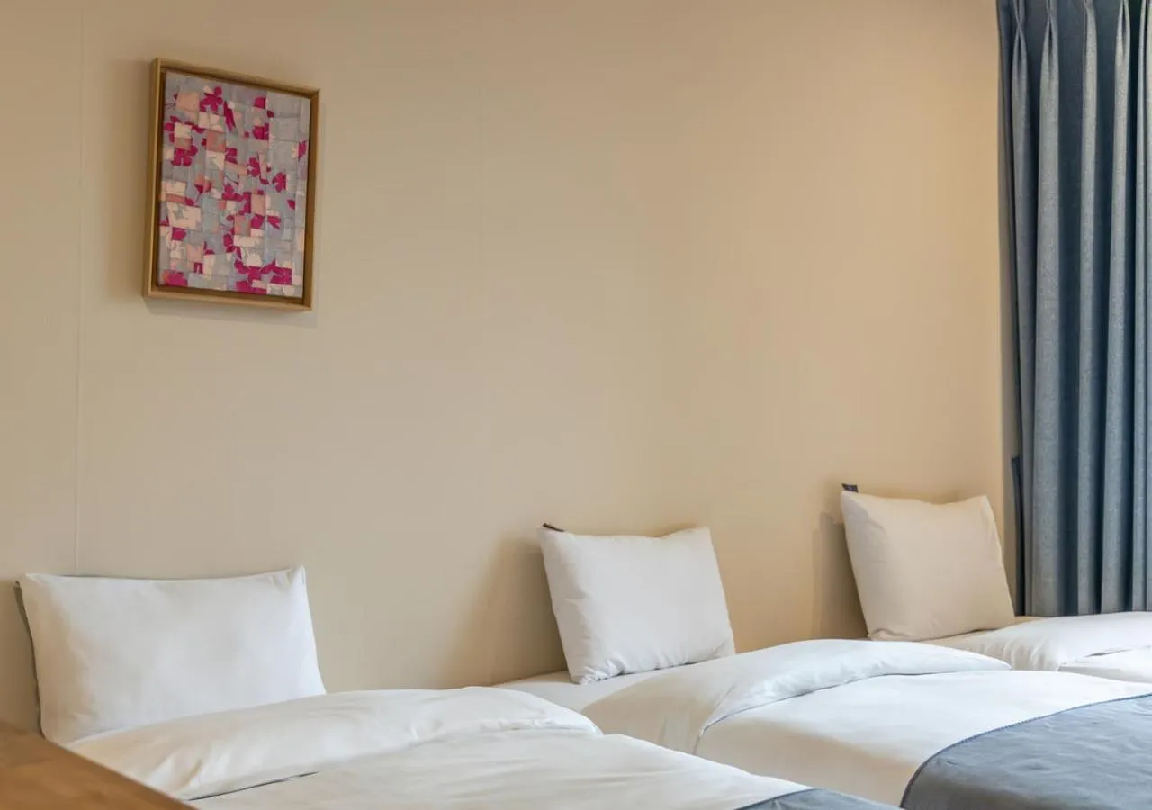 Bedroom, Bed in JK Blossom Hotel