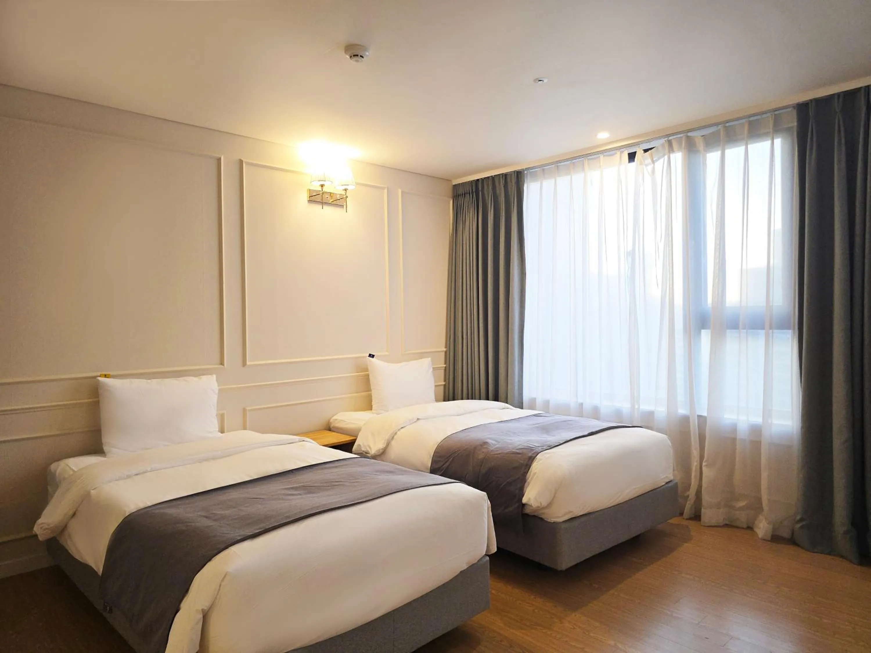 Bedroom, Bed in JK Blossom Hotel