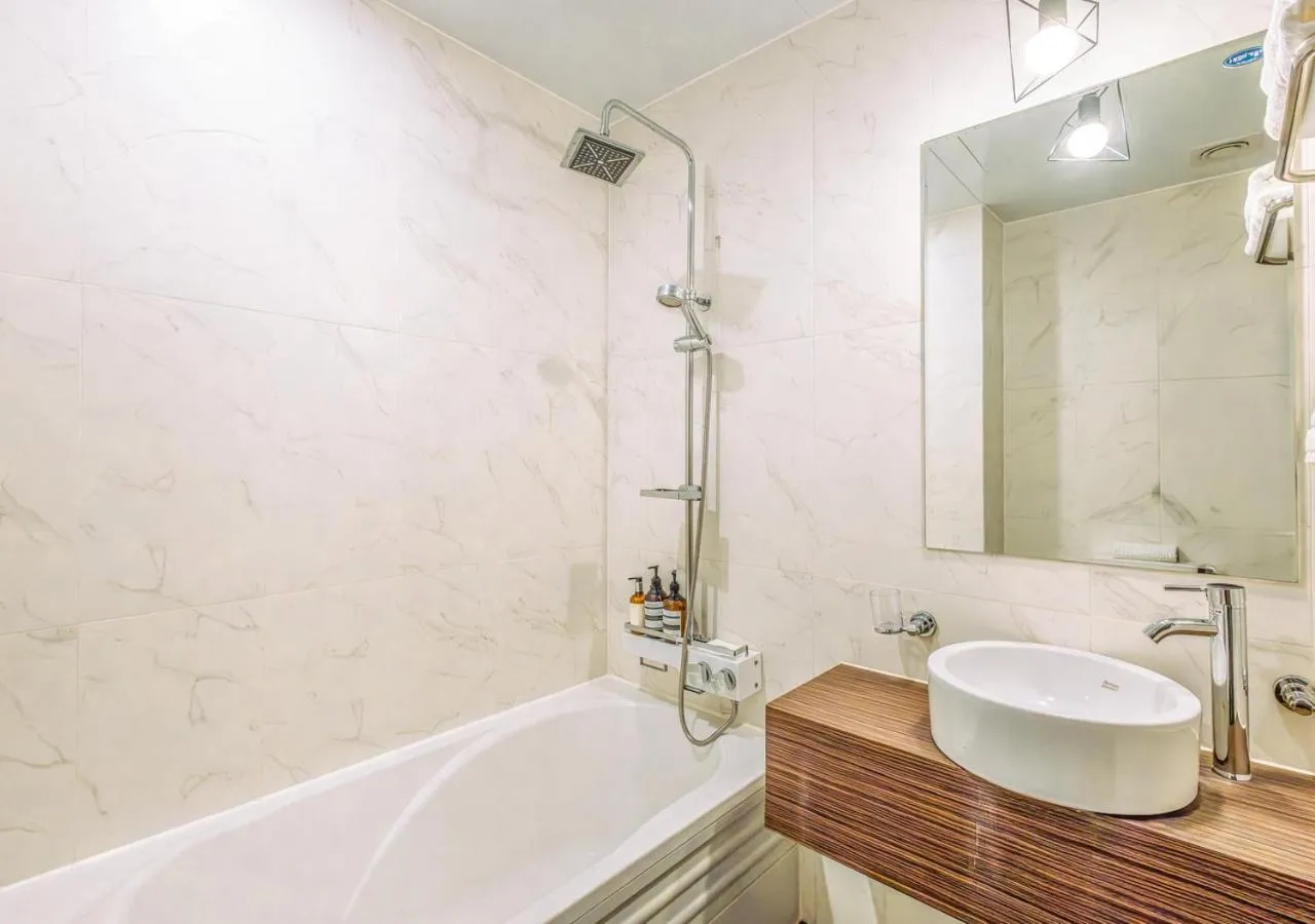 Bathroom in JK Blossom Hotel