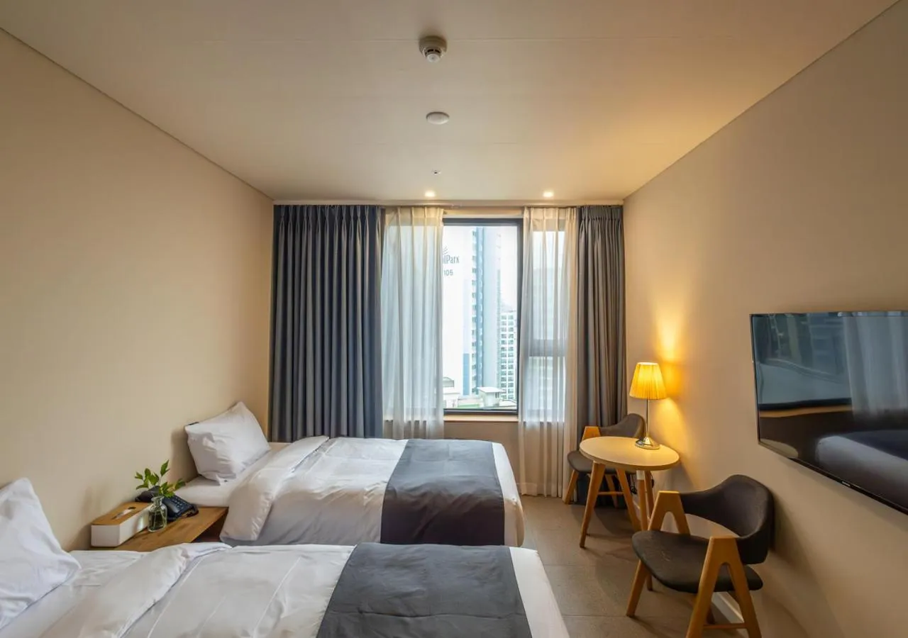 Bedroom, Bed in JK Blossom Hotel