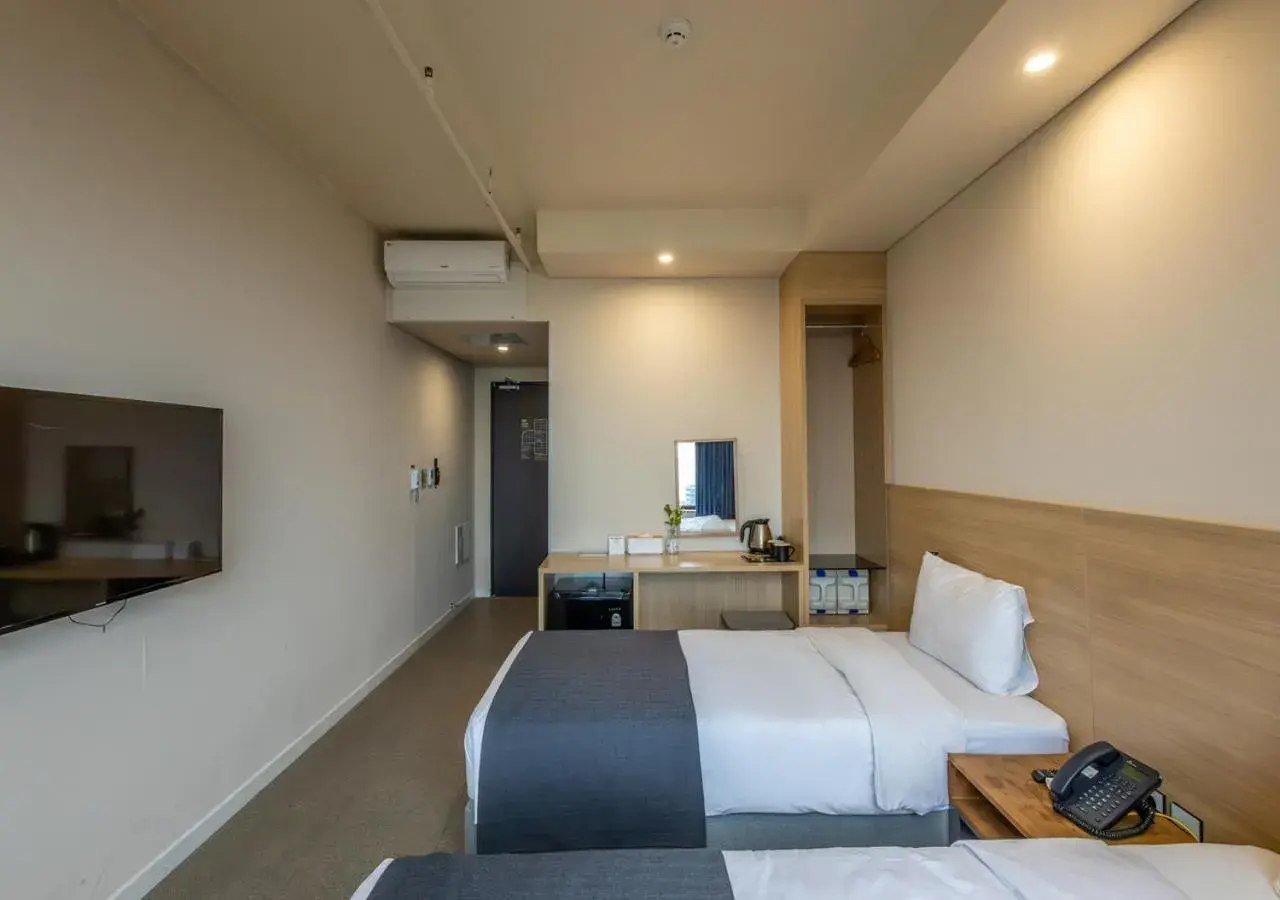 Business Twin Room with City View in JK Blossom Hotel Business Twin Room with City View in JK Blossom Hotel