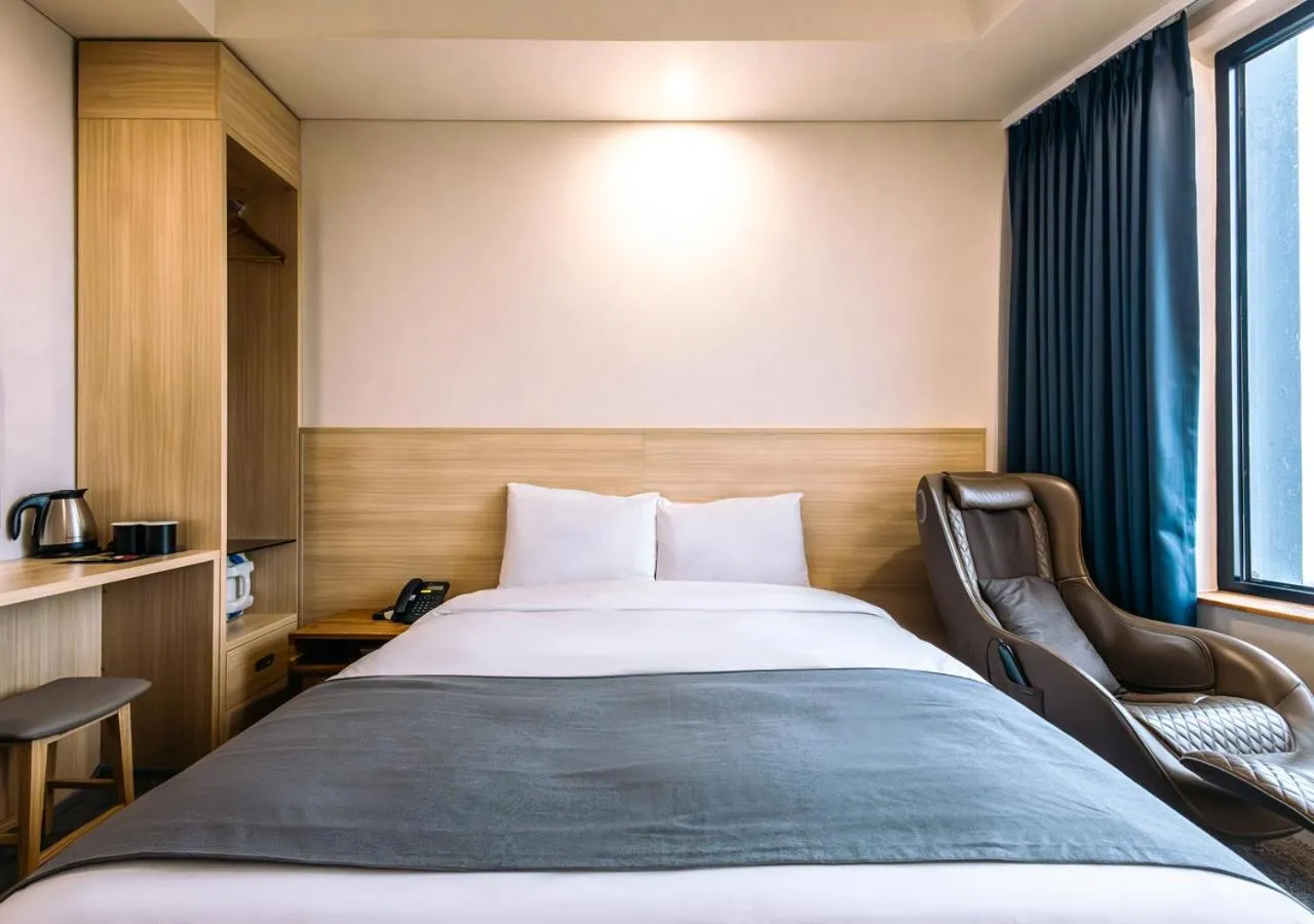 Bedroom, Bed in JK Blossom Hotel