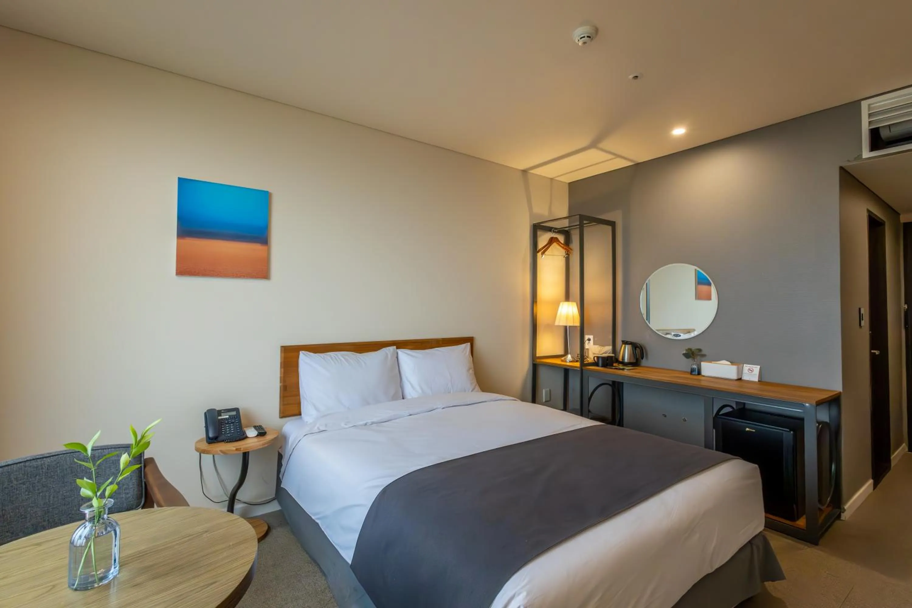 Bedroom, Bed in JK Blossom Hotel