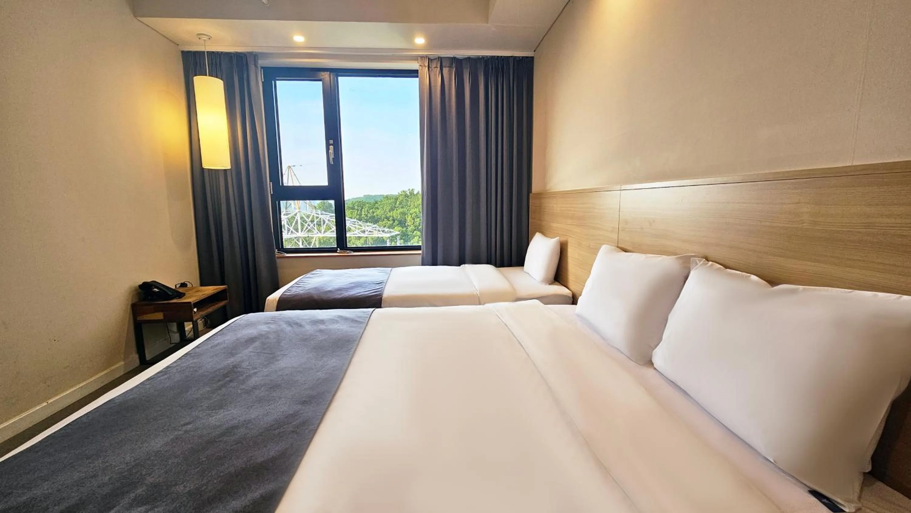 Bedroom, Bed in JK Blossom Hotel