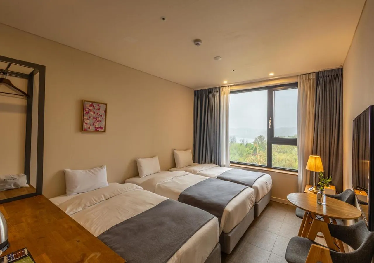 Bedroom, Bed in JK Blossom Hotel