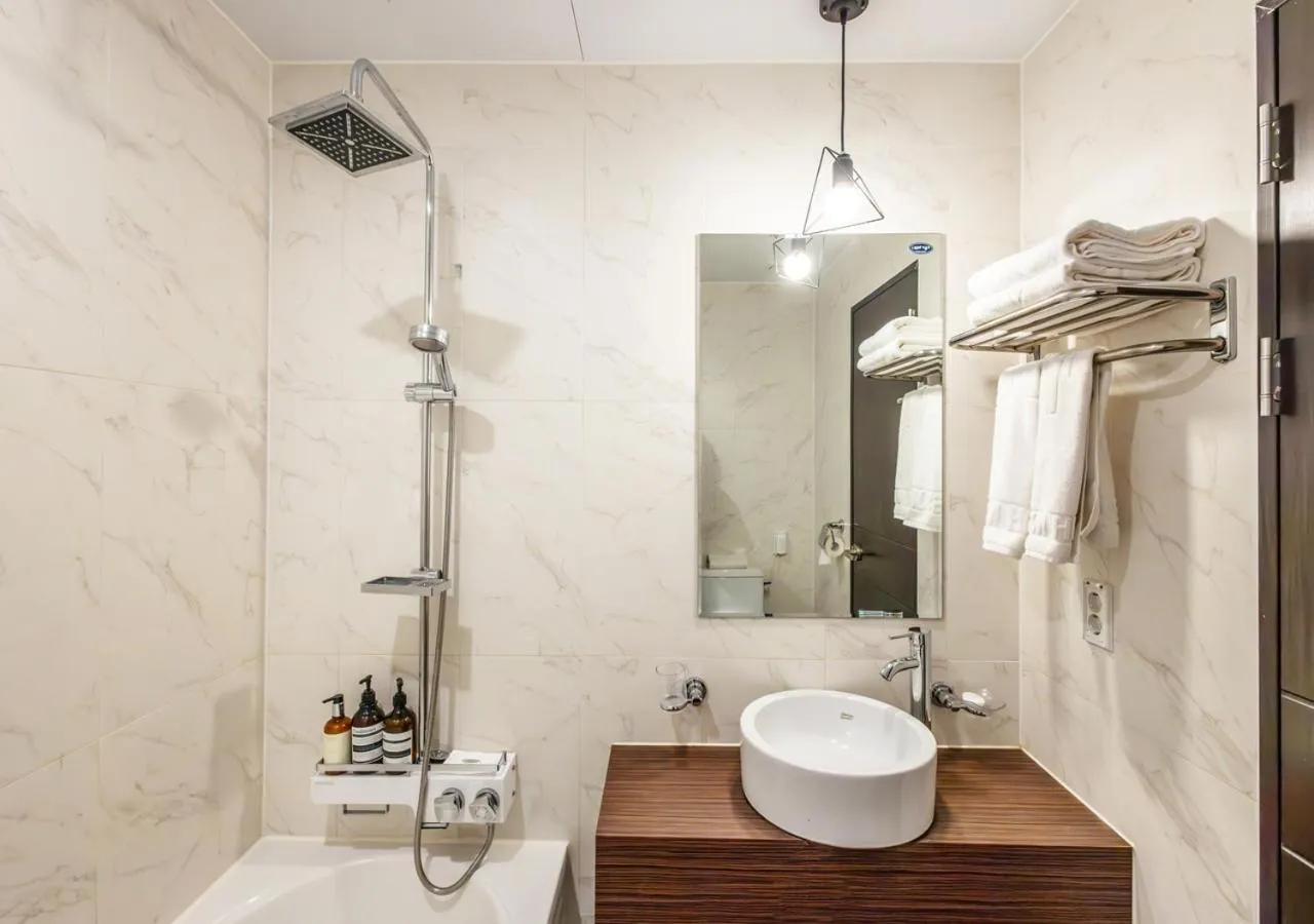 Bathroom in JK Blossom Hotel