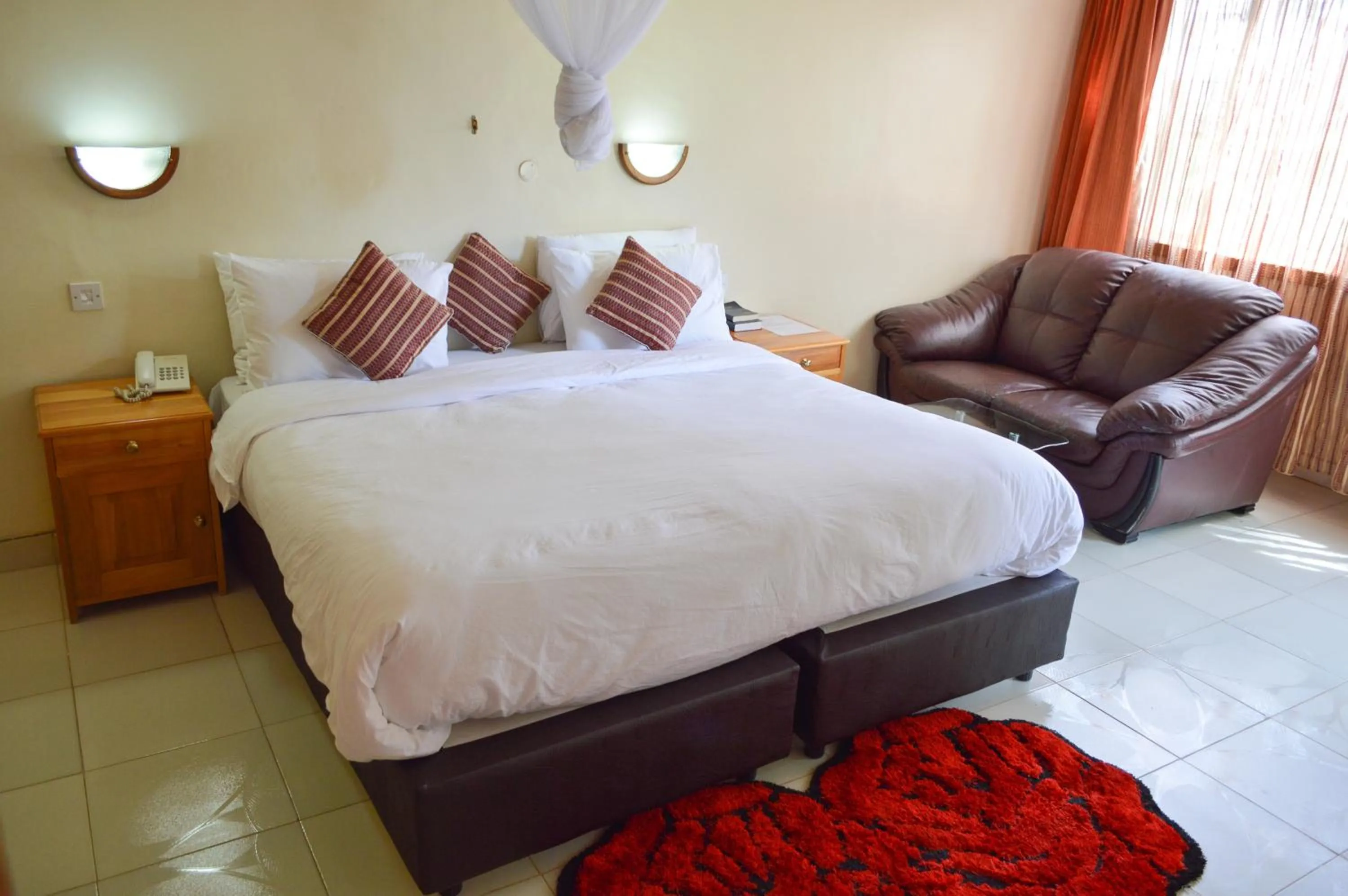 Living room, Bed in Golf Hotel Kakamega