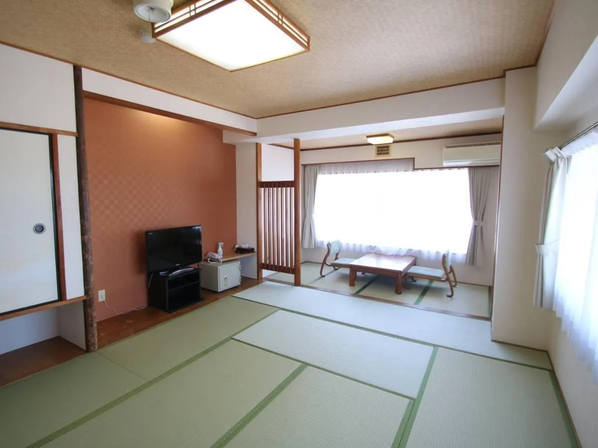 Bedroom, Bed in Itoen Hotel Inatori