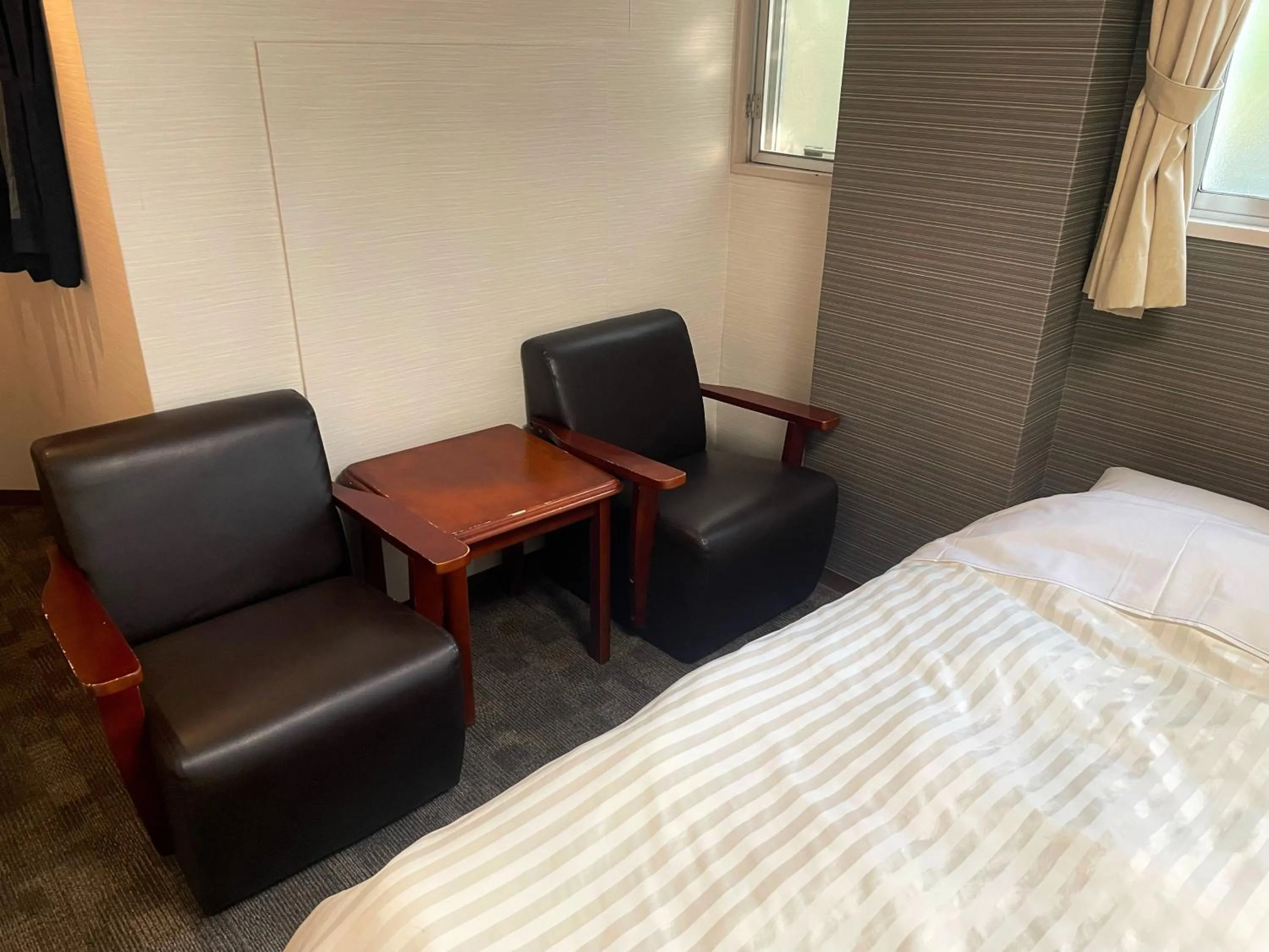 Bedroom, Bed in Itoen Hotel Inatori