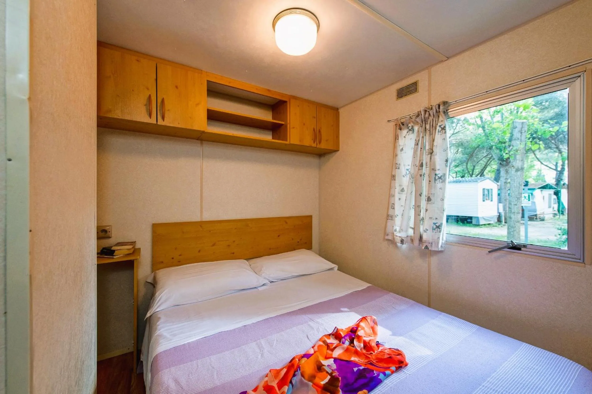 Bed in Camping Village Punta Navaccia