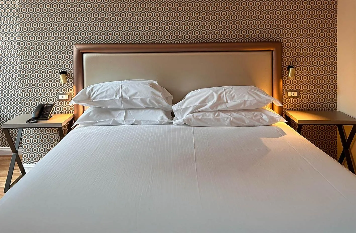 Bed in Caruso Place Luxury Rooms & Suites