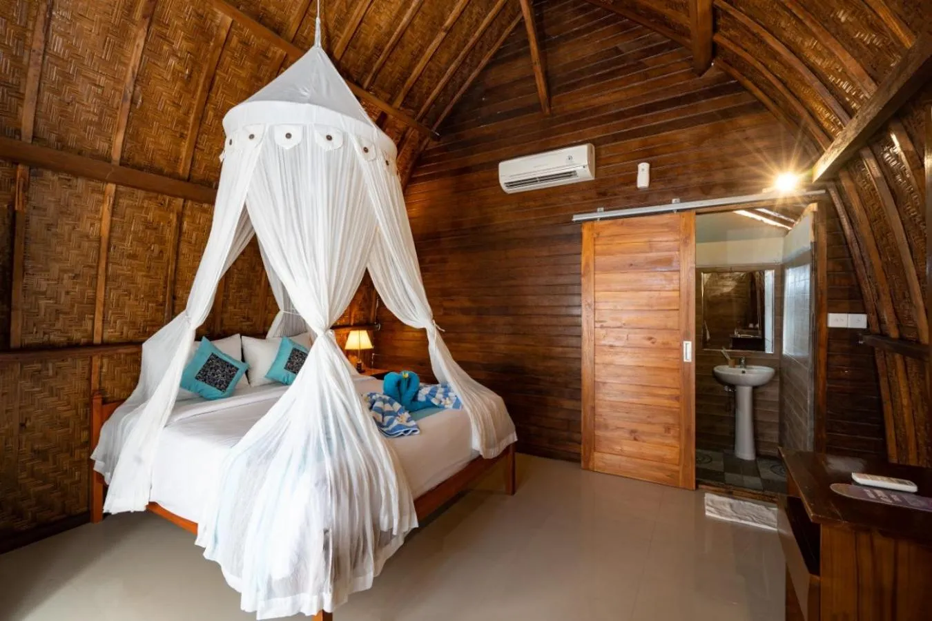 Bed in Sundi Ocean Bungalow by ABM
