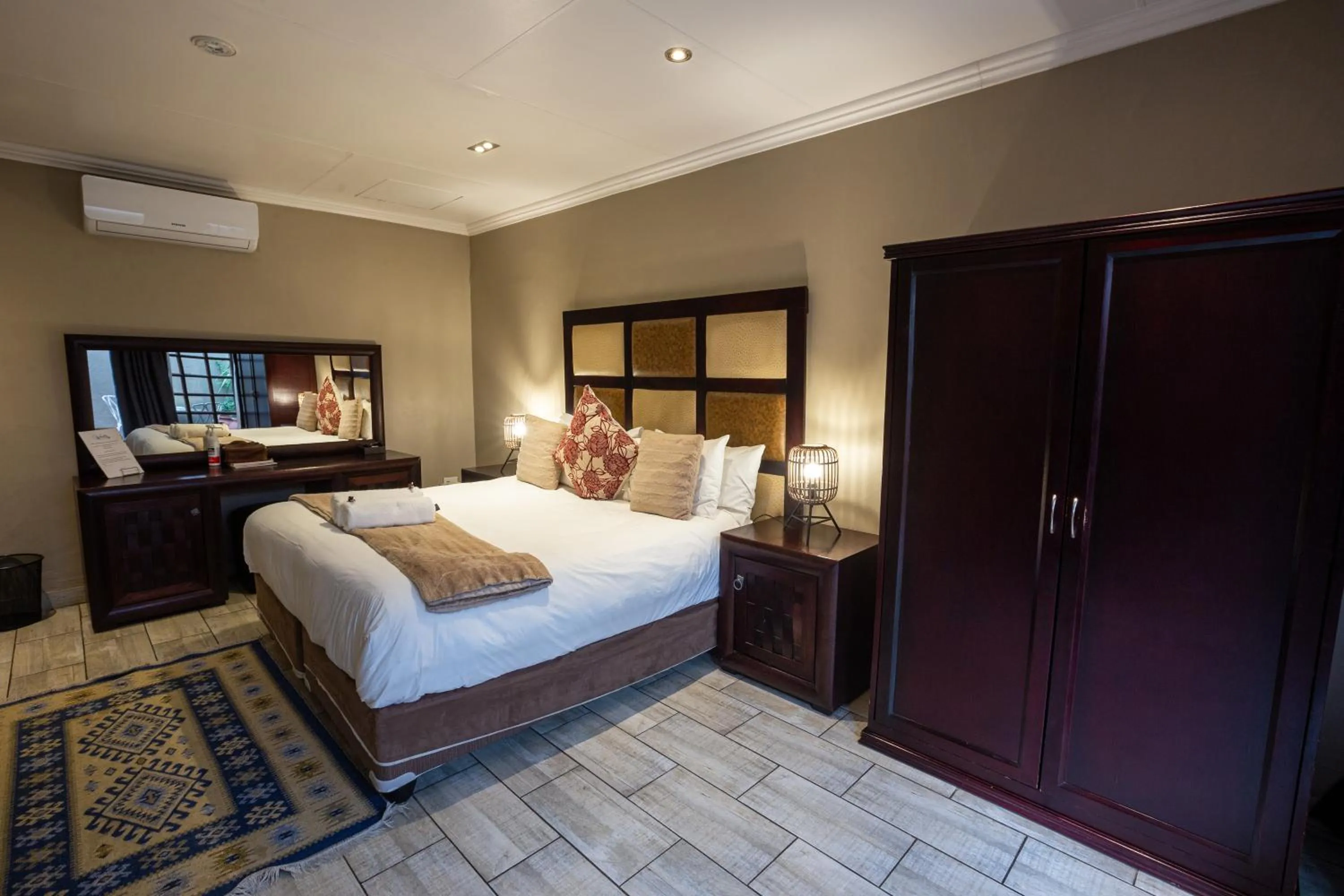 Bed in Waterfalls Boutique Hotel