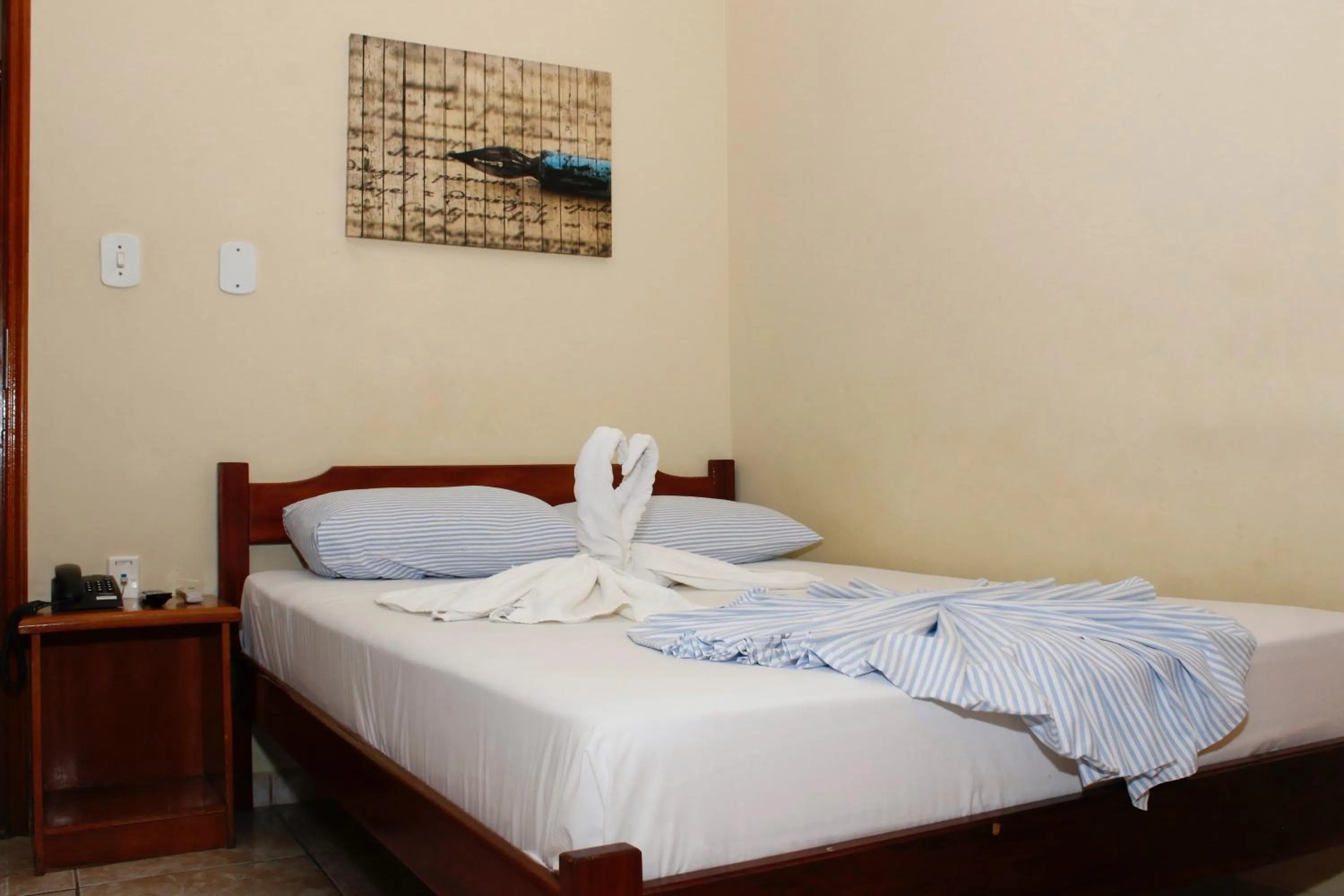 Bed in Hotel Santo Graal