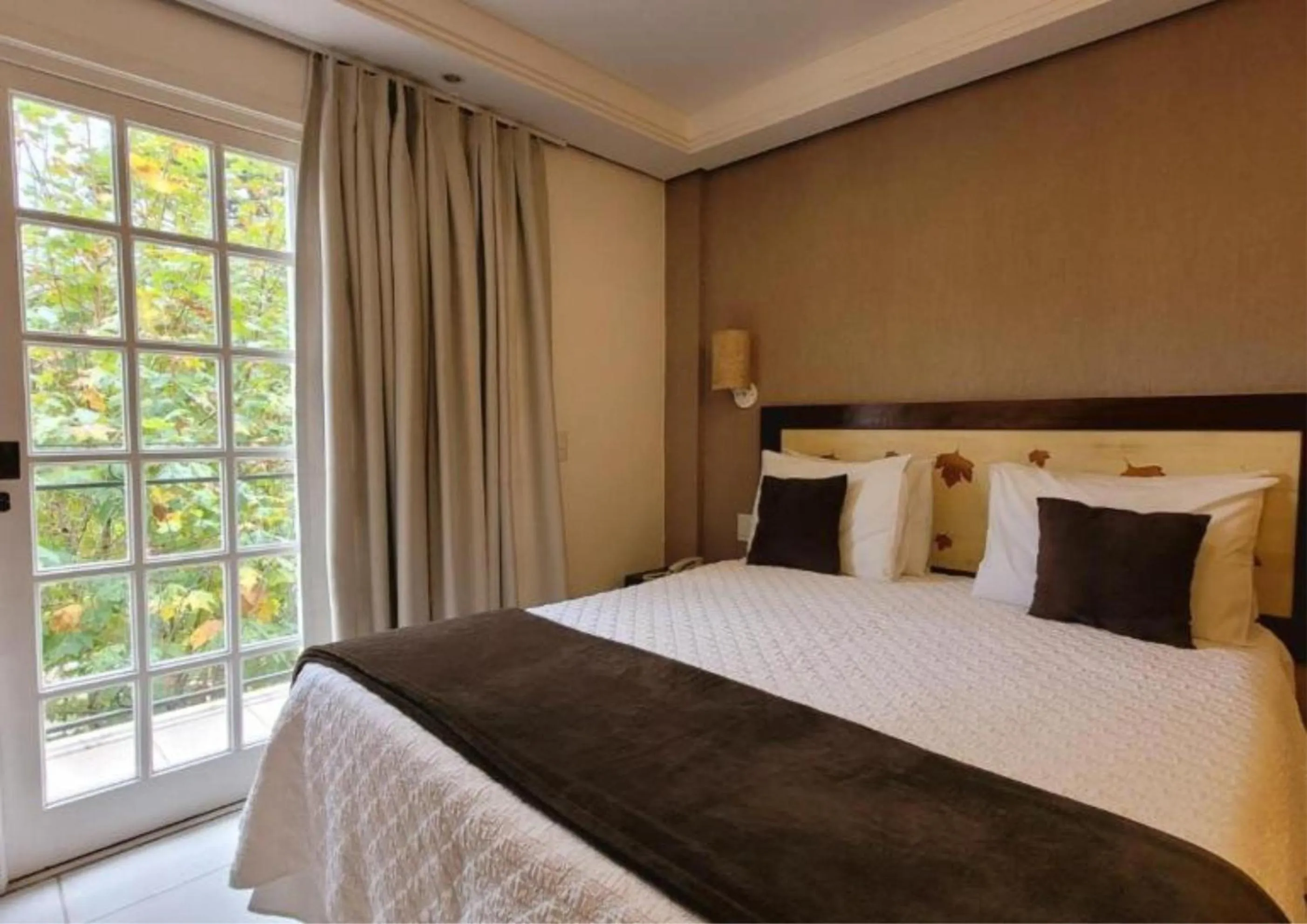 Bed in Pousada Cheverny - Fácil acesso ao centrinho e Baden Bar