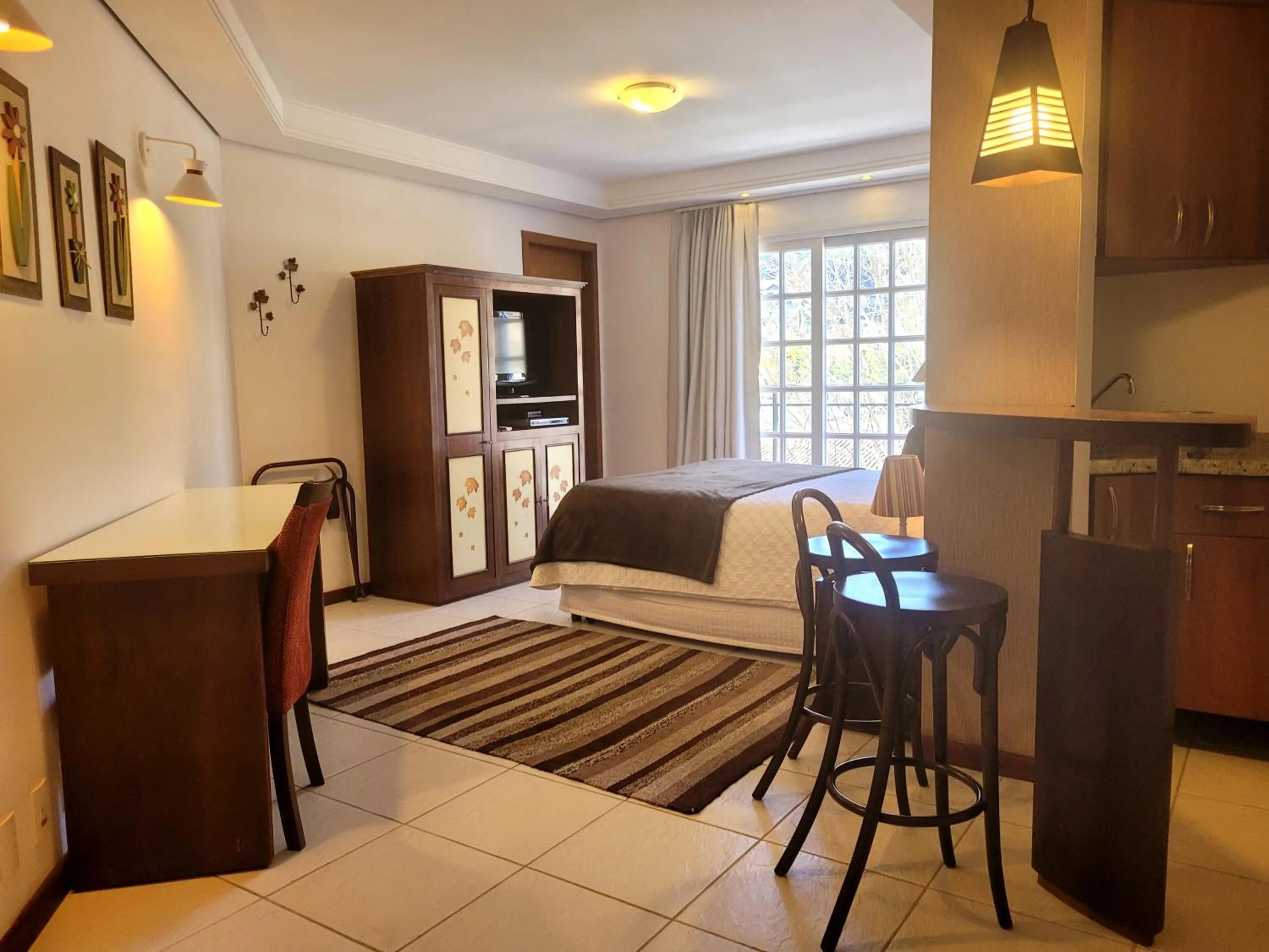 Bed in Pousada Cheverny - Fácil acesso ao centrinho e Baden Bar