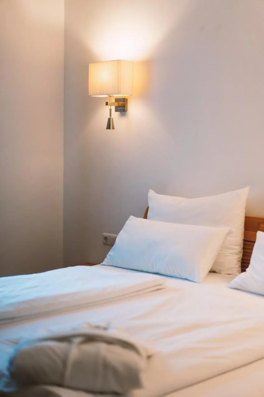 Bed in Aktivhotel Wildschütz