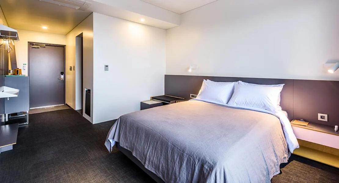 Bedroom in Jeju Bricks Hotel