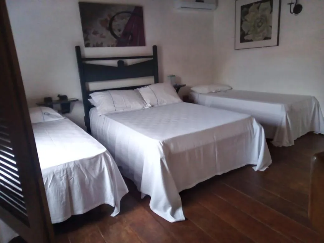 Bed in Recanto das Andorinhas Studios