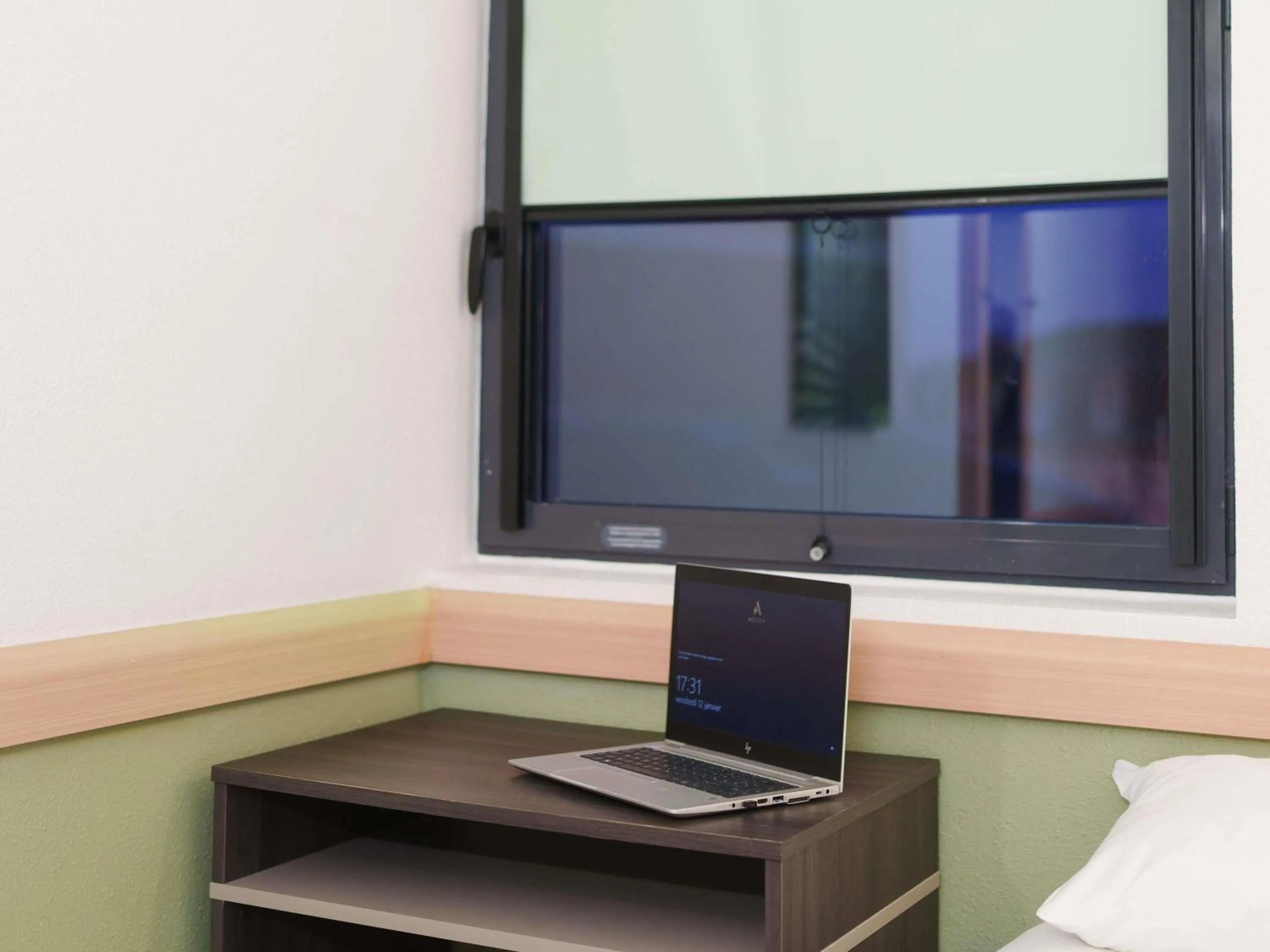 Bedroom in ibis budget Saint-Quentin Centre Gare