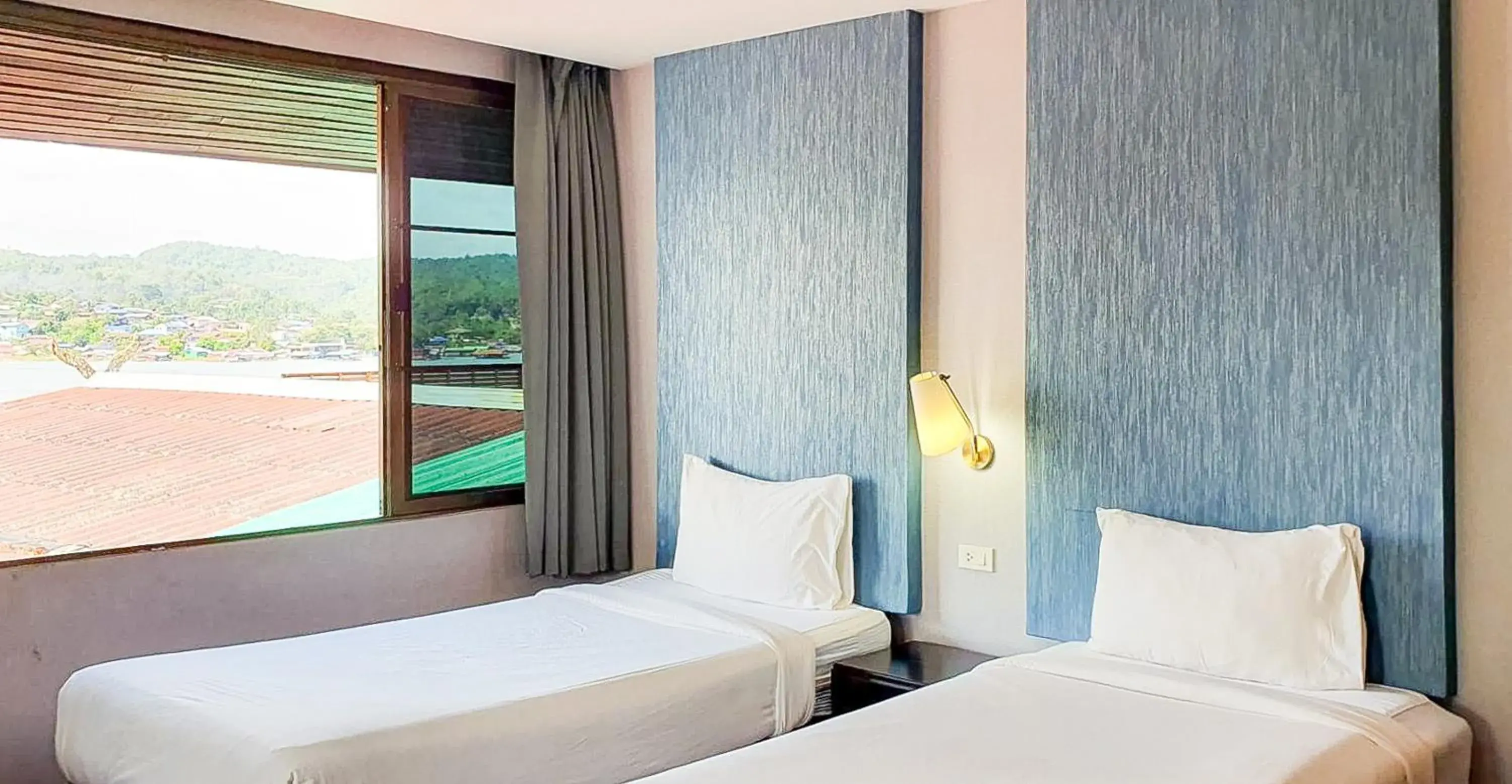 Standard Twin Room in Phornpailin Riverside Resort Standard Twin Room in Phornpailin Riverside Resort