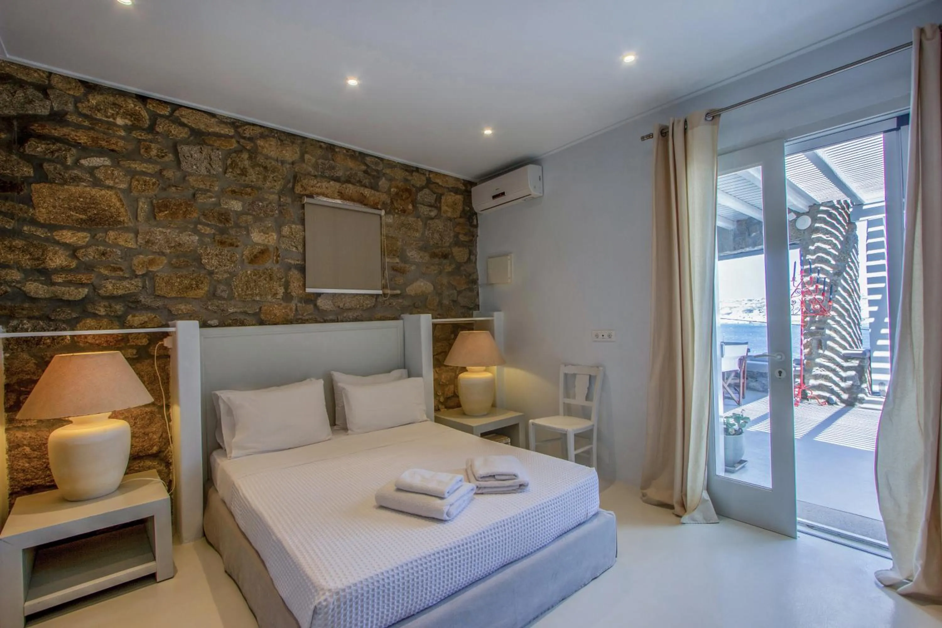 Bed in Amaris Mykonian Residence