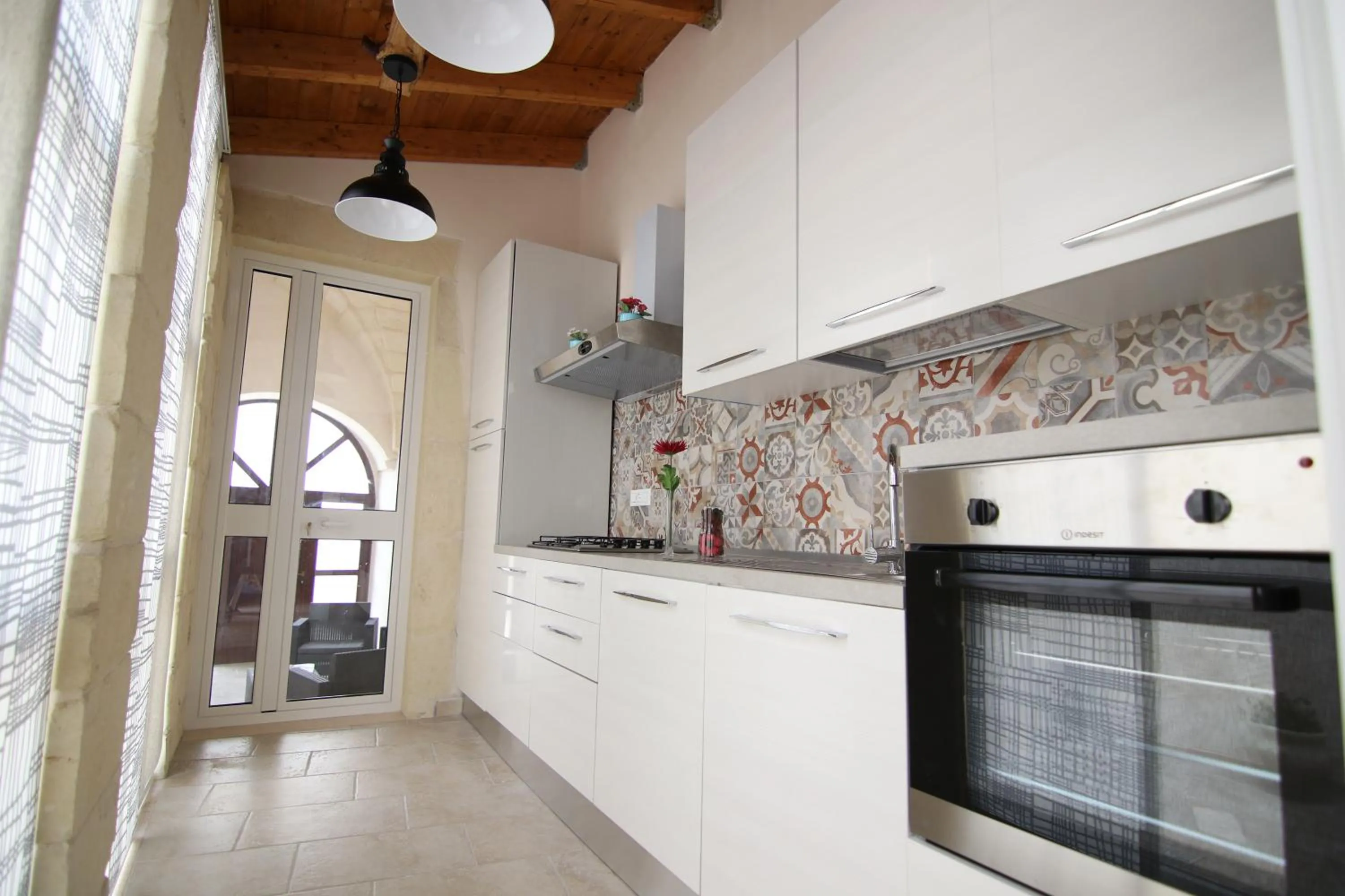 Kitchen or kitchenette in Corte Manzoni