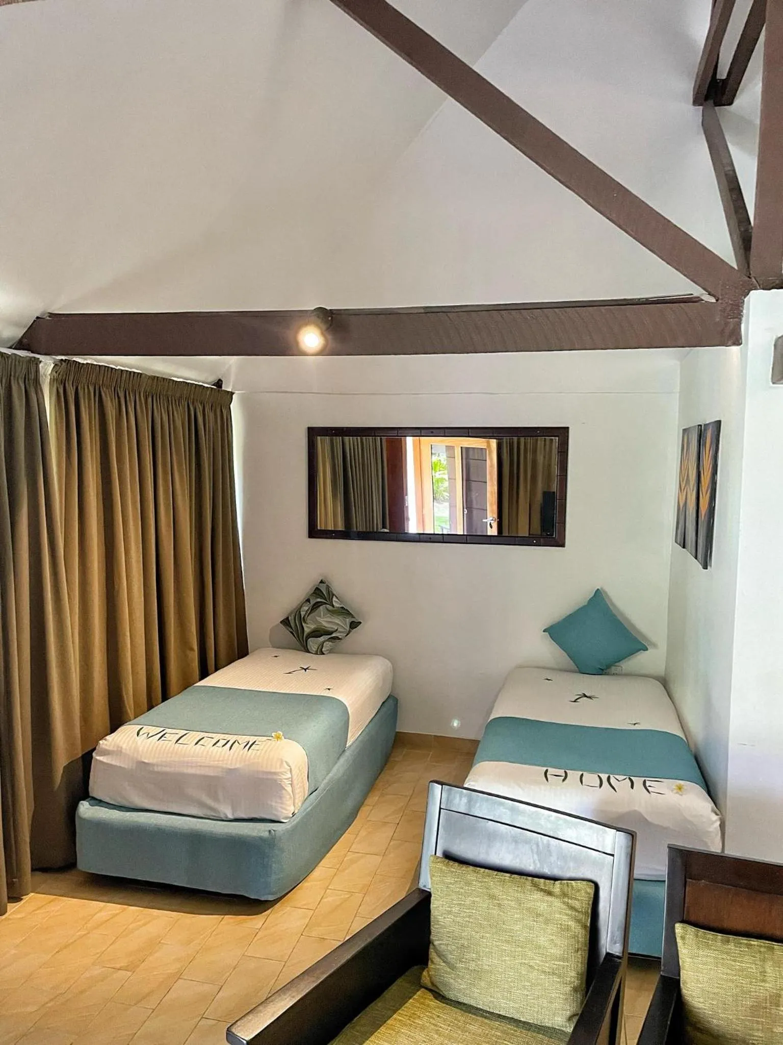 Bed in Tambua Sands Beach Resort