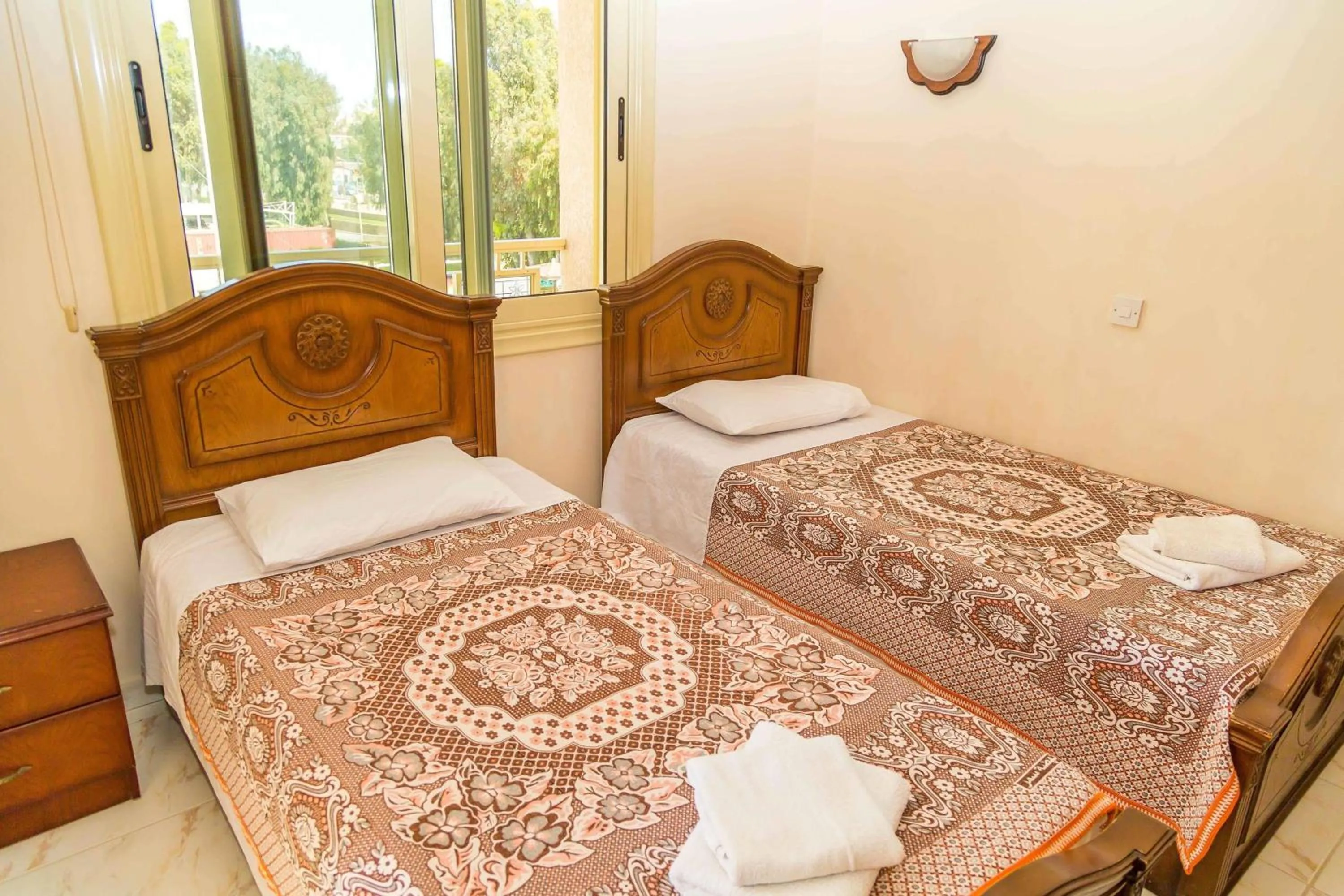 Bed in Chrysanthos Boutique Apartments