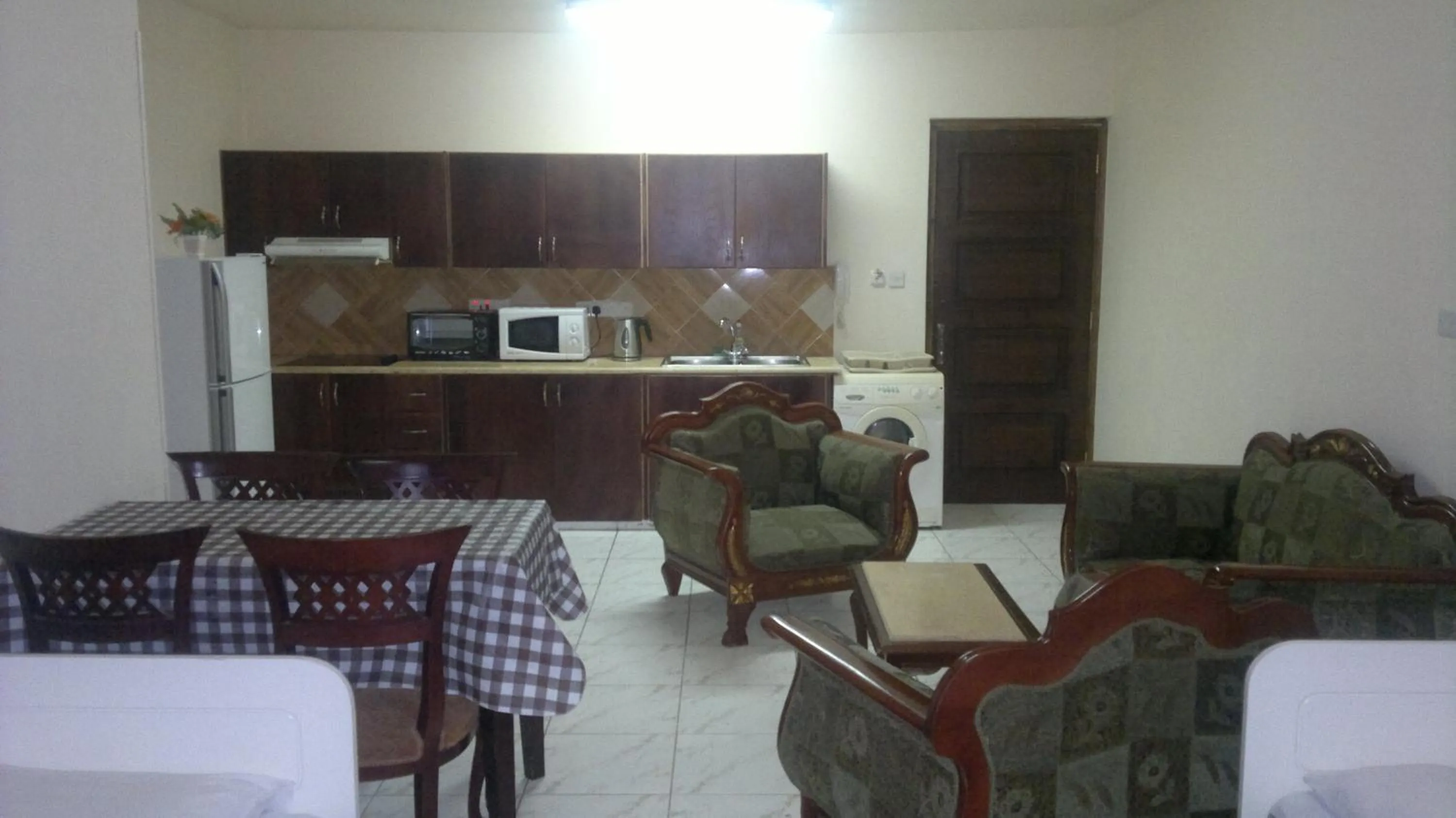 Seating area in Chrysanthos Boutique Apartments