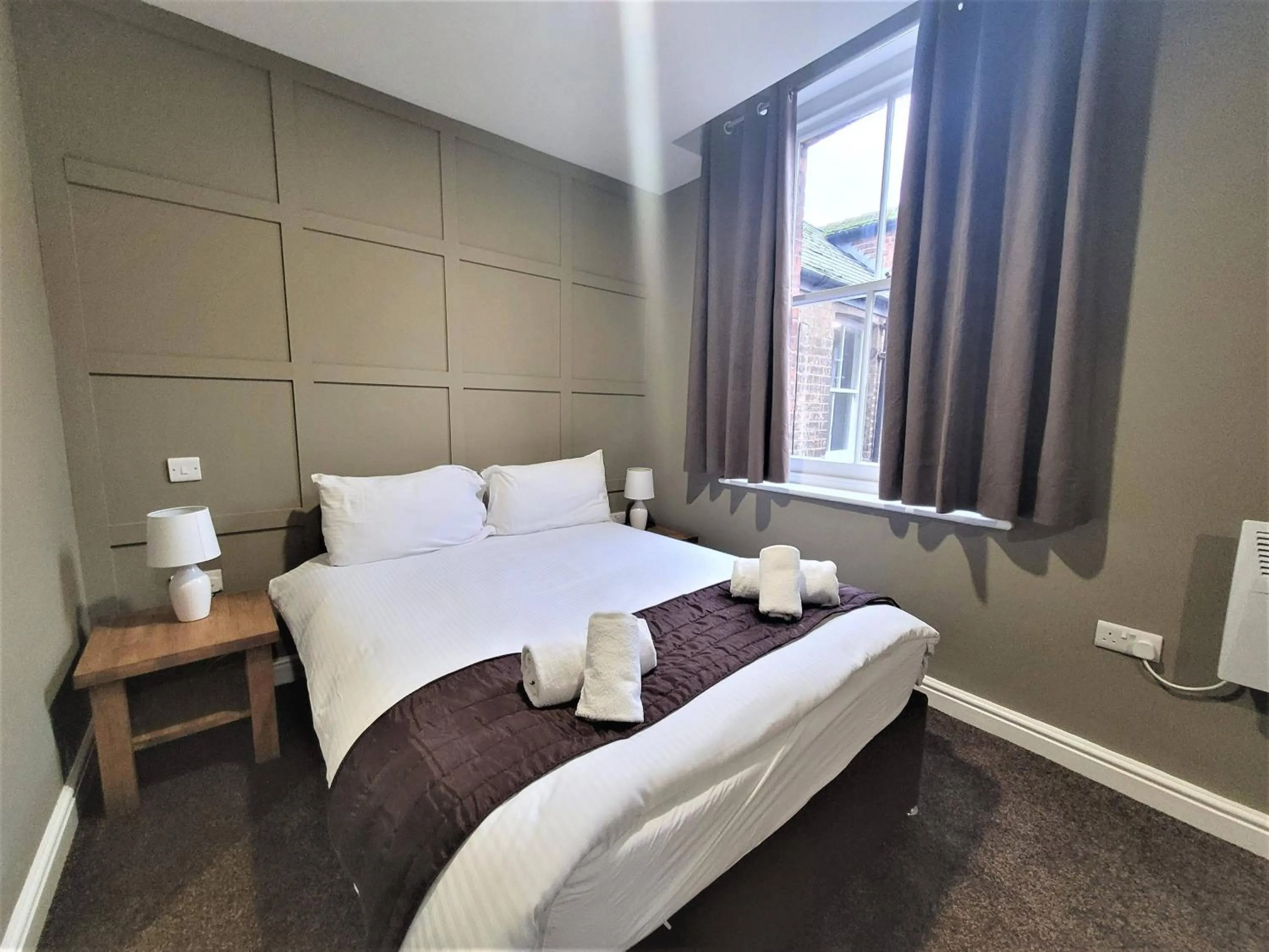 Bed in New County Hotel & Serviced Apartments by RoomsBooked