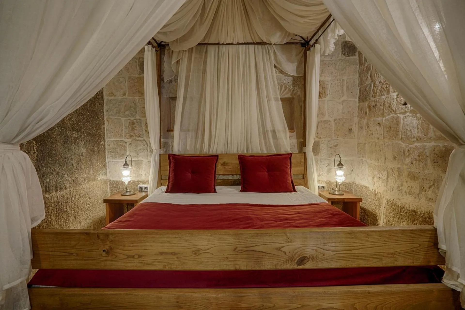 Bed in Hera Cave Suites