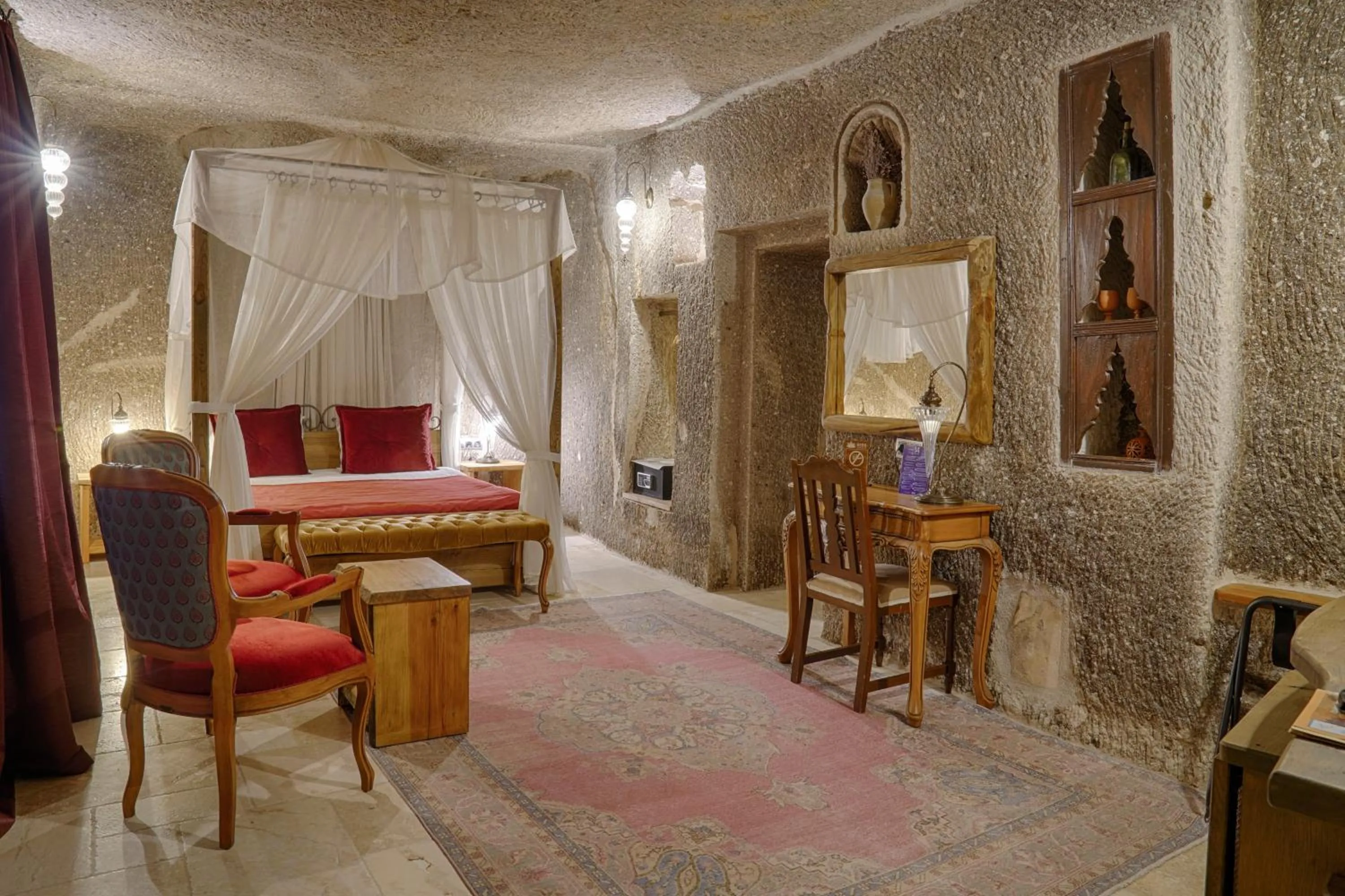 Bed in Hera Cave Suites
