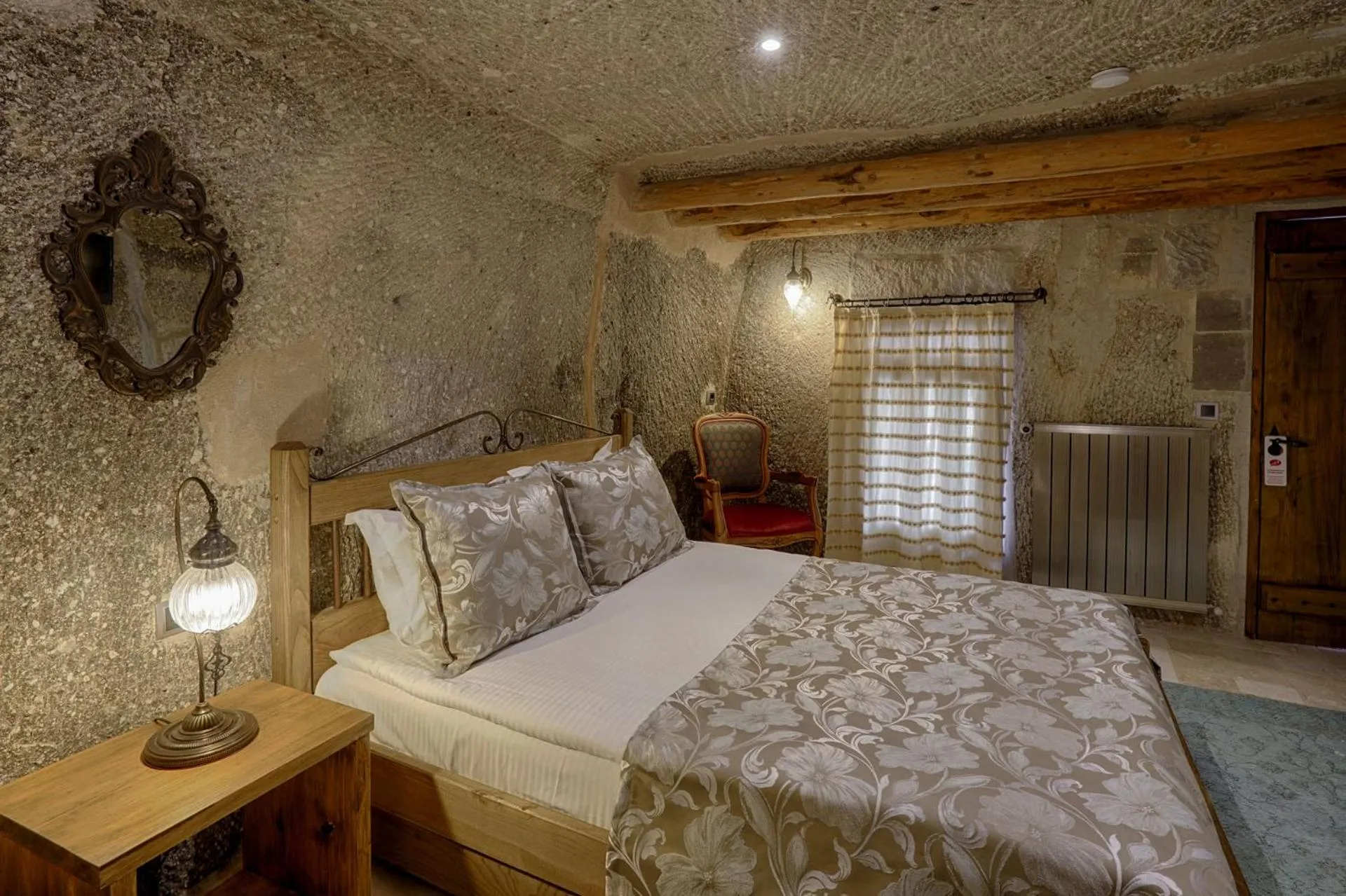 Bed in Hera Cave Suites