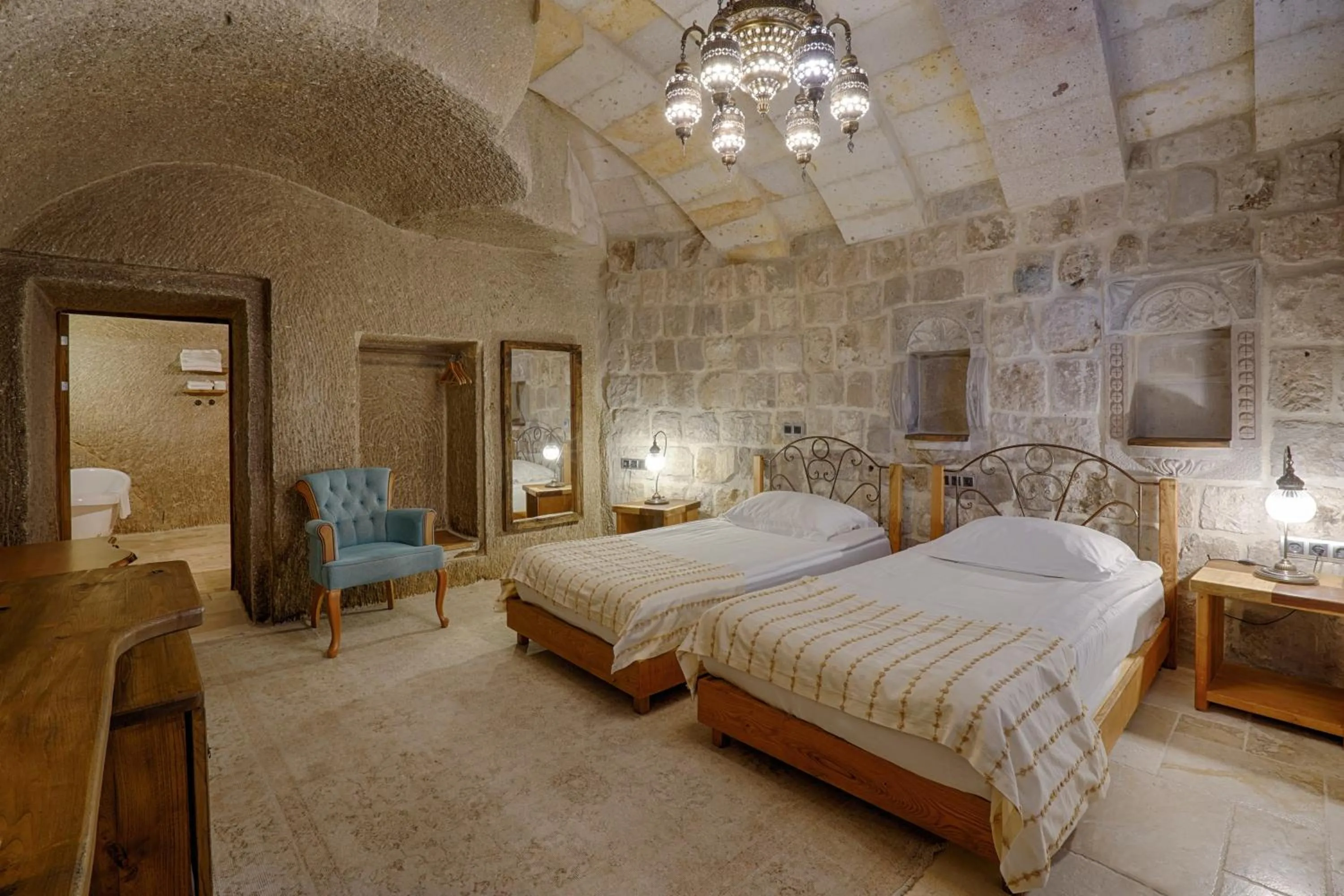 Bed in Hera Cave Suites