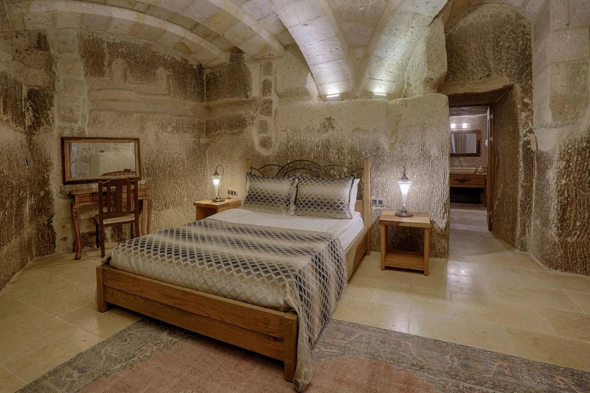Bed in Hera Cave Suites