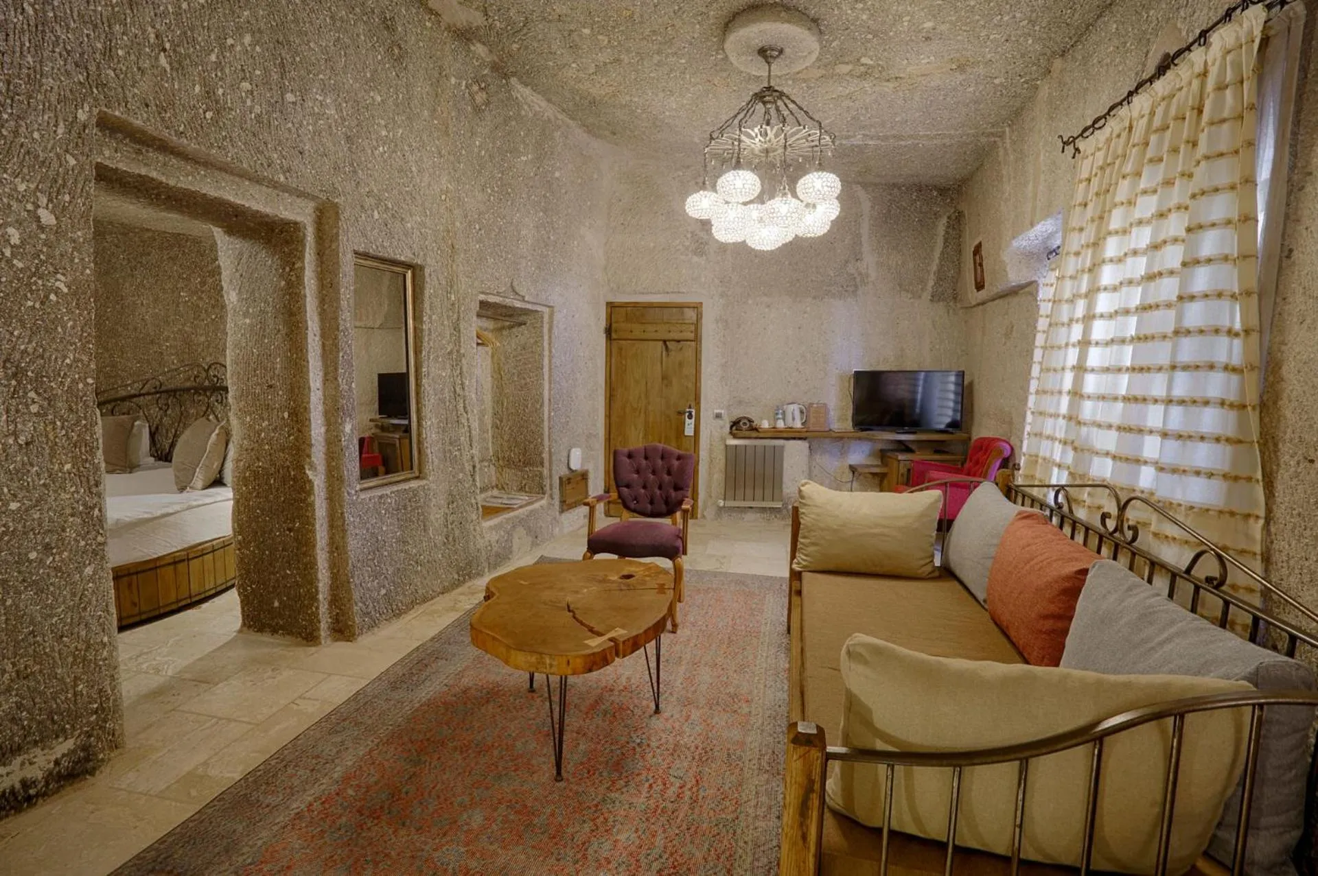 Living room, Bed in Hera Cave Suites