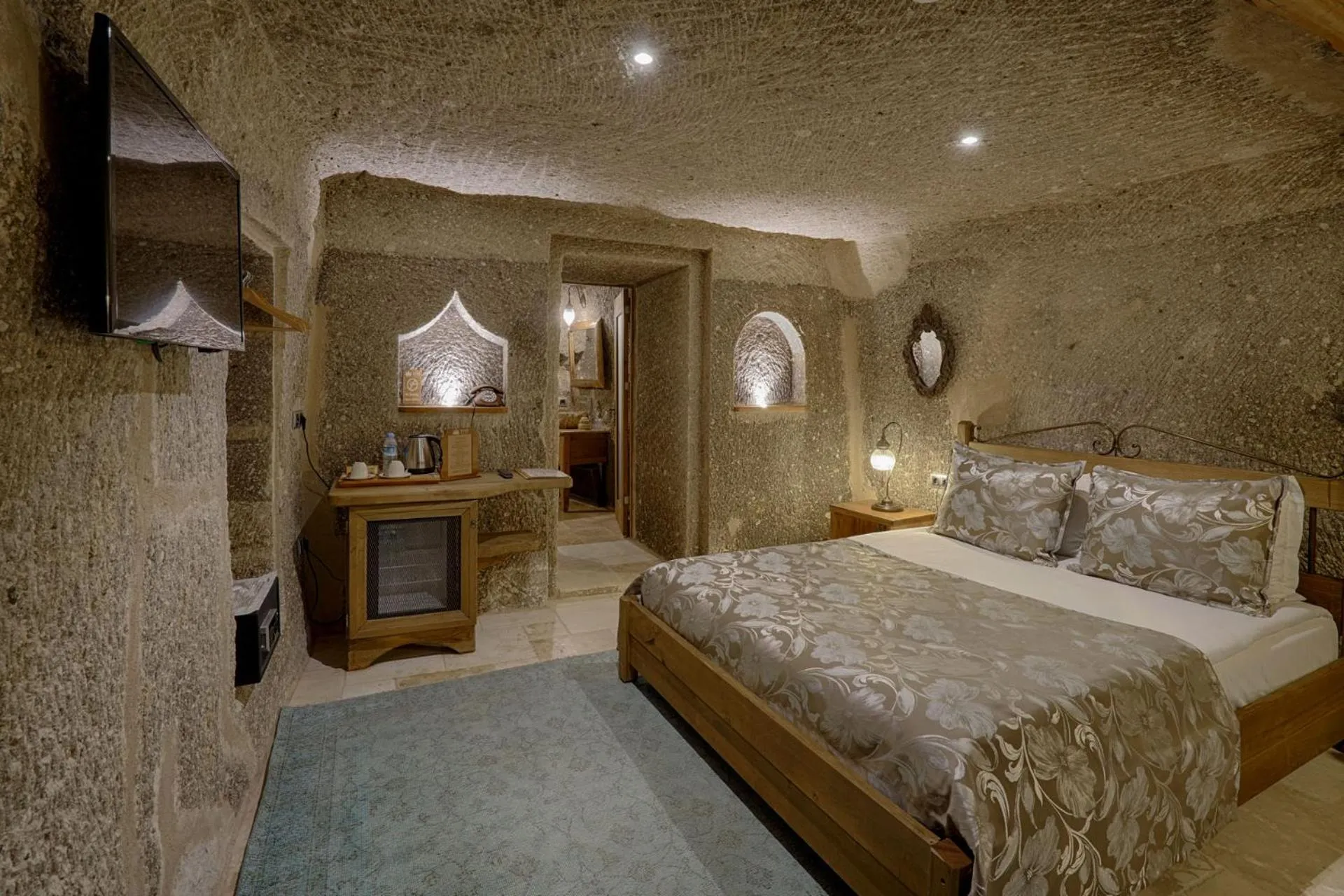 Bed in Hera Cave Suites