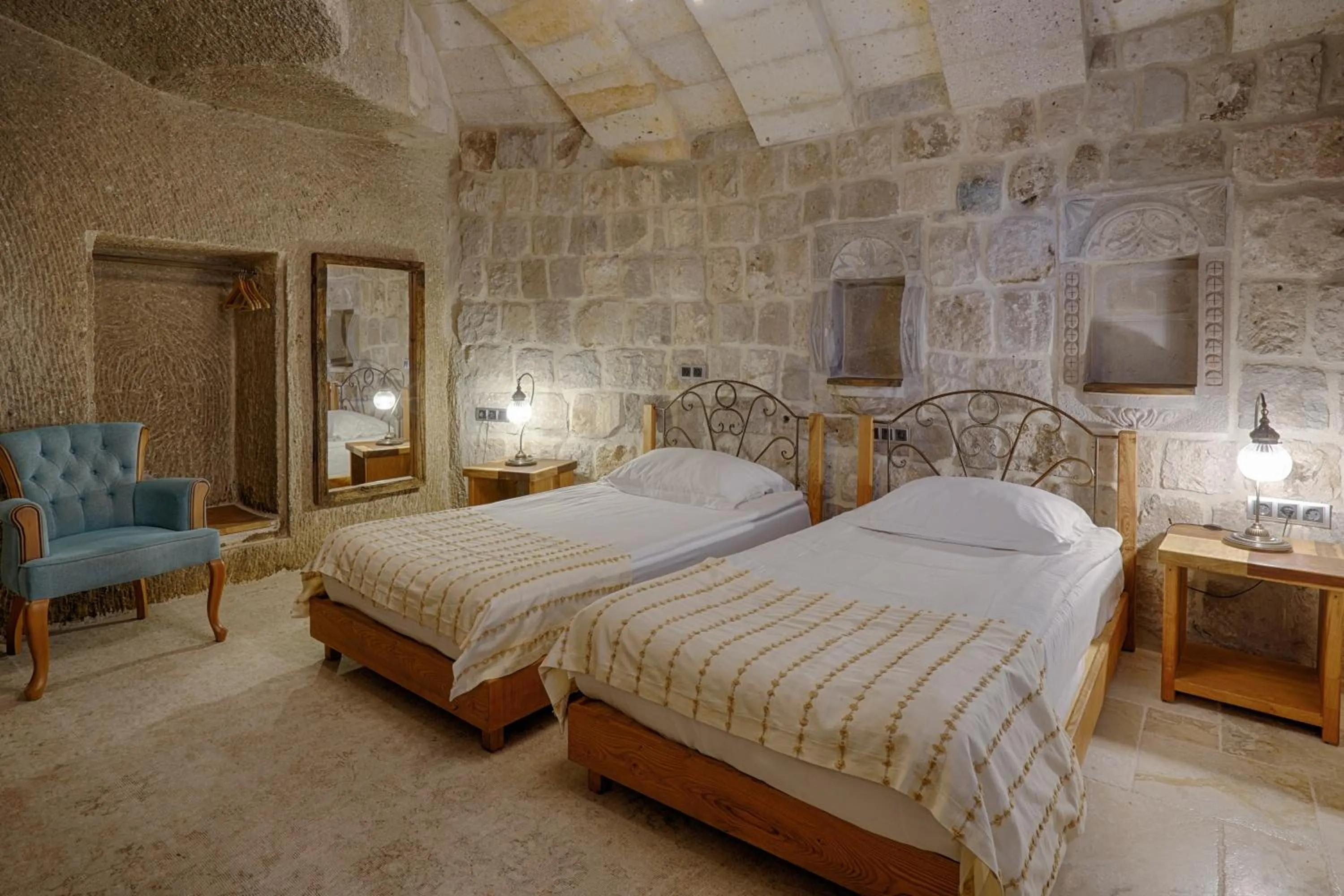 Bed in Hera Cave Suites