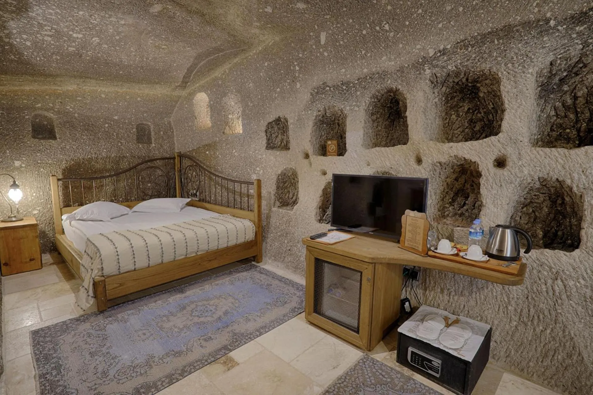 Bed in Hera Cave Suites