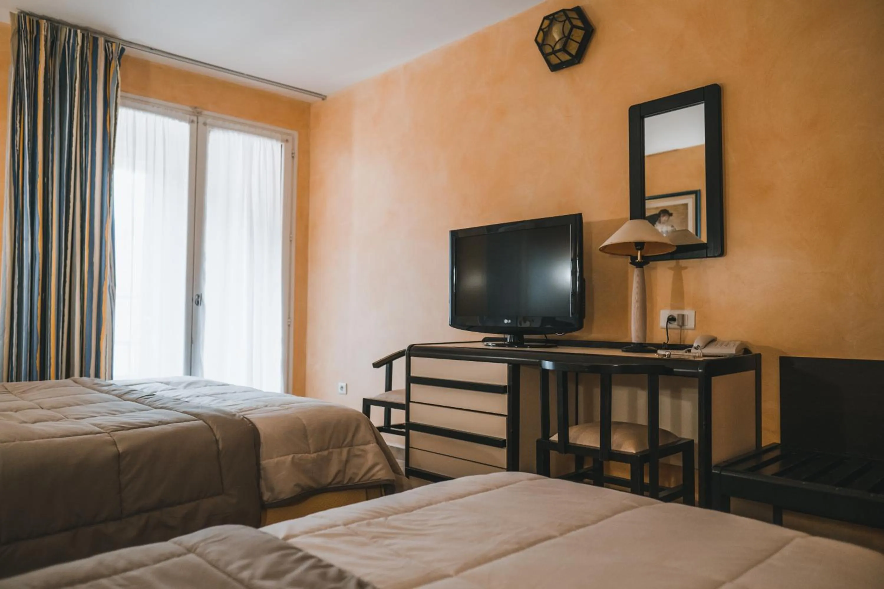 Bed in Hôtel & Résidence Le Subrini