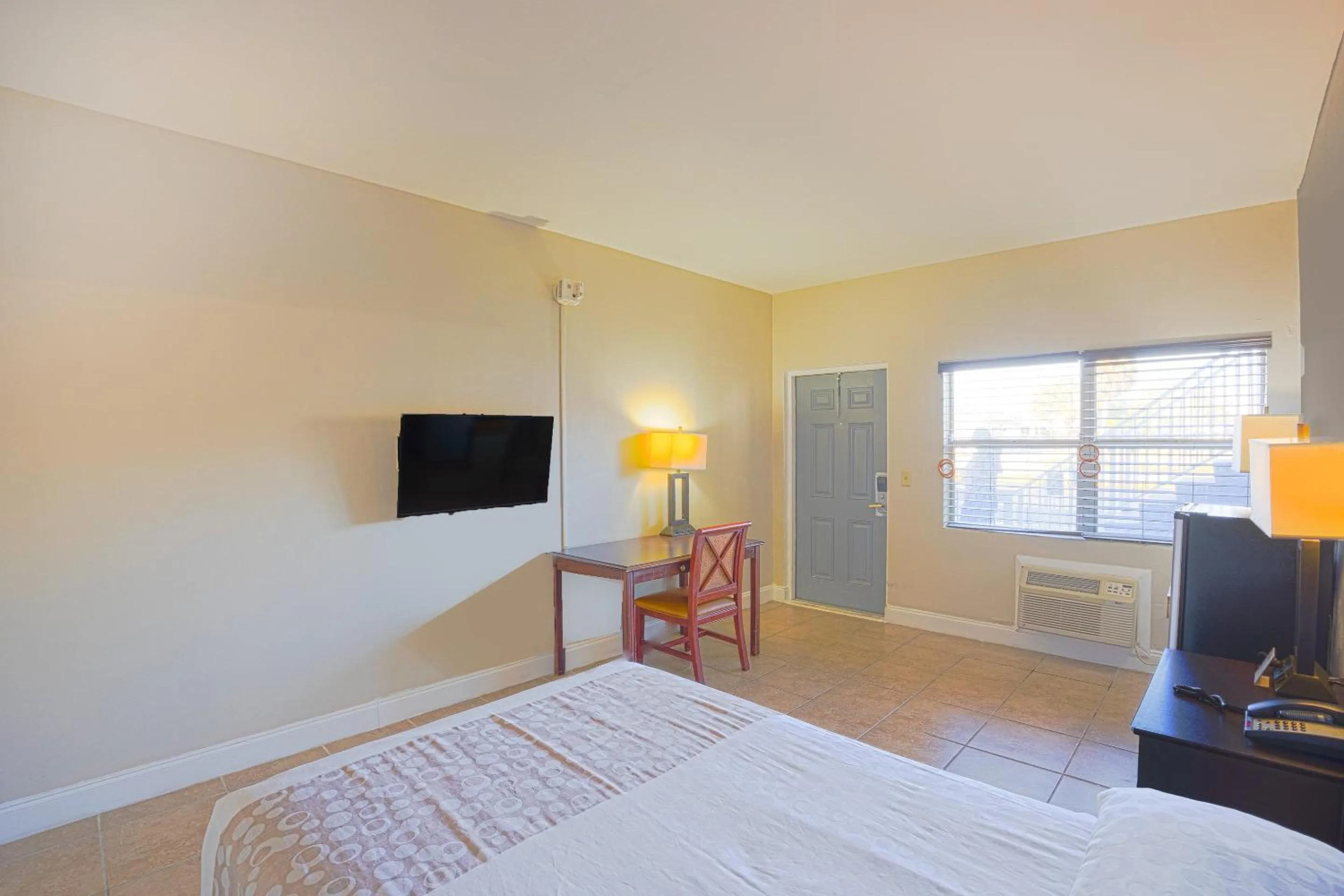 Bedroom, Bed in Sunrise Inn by OYO Titusville FL