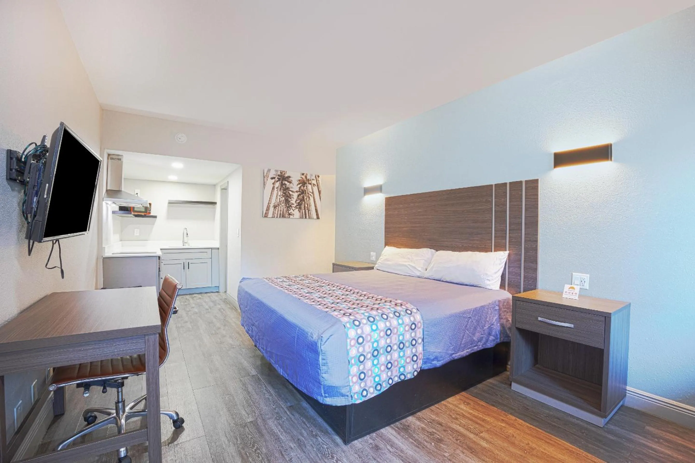 Bedroom, Bed in Sunrise Inn by OYO Titusville FL