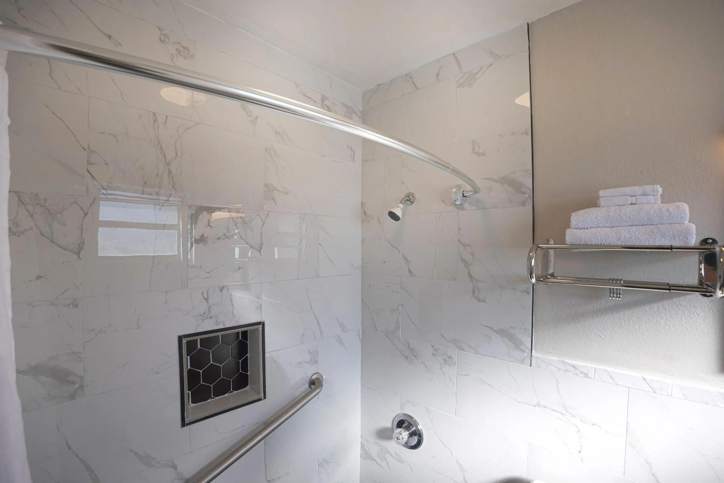 Bathroom in Sunrise Inn by OYO Titusville FL