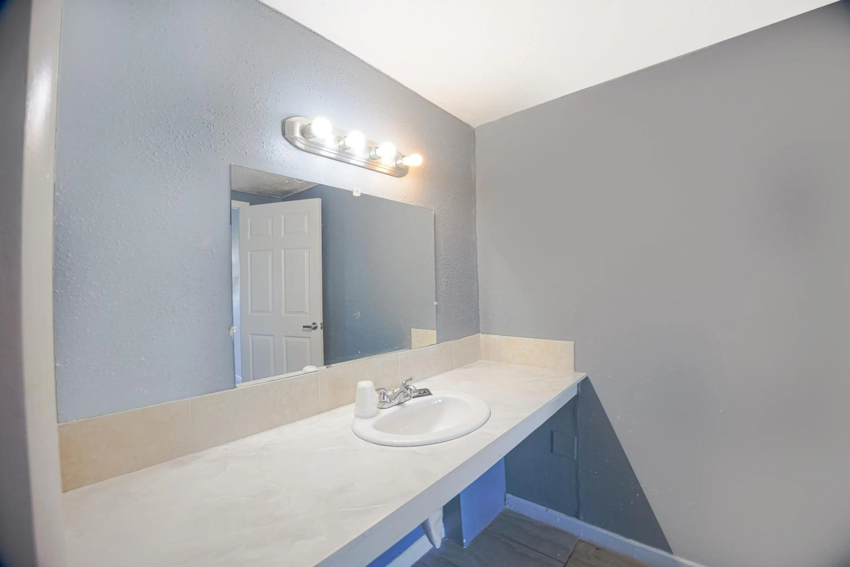 Bathroom in Sunrise Inn by OYO Titusville FL