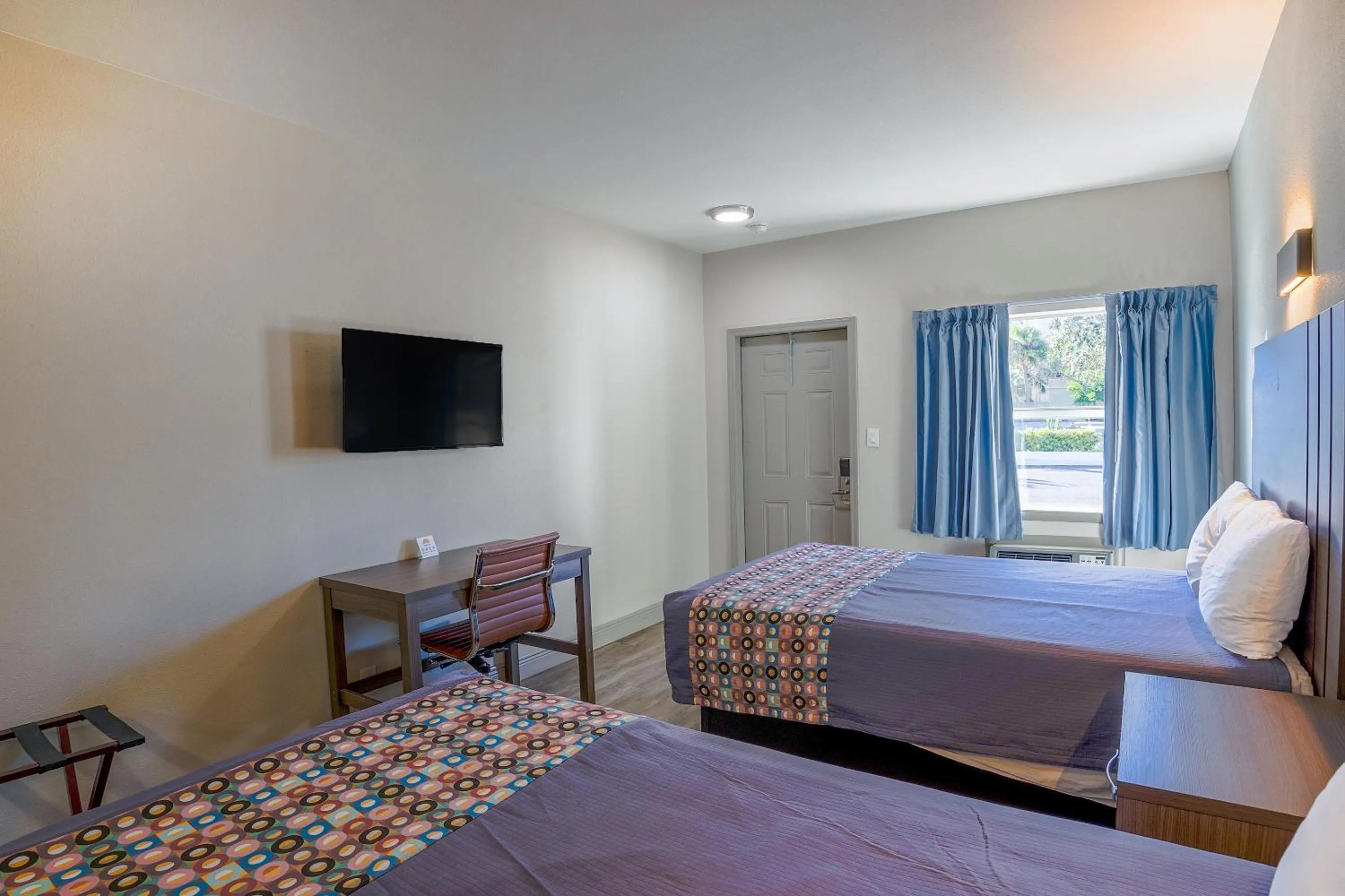 Bedroom, Bed in Sunrise Inn by OYO Titusville FL