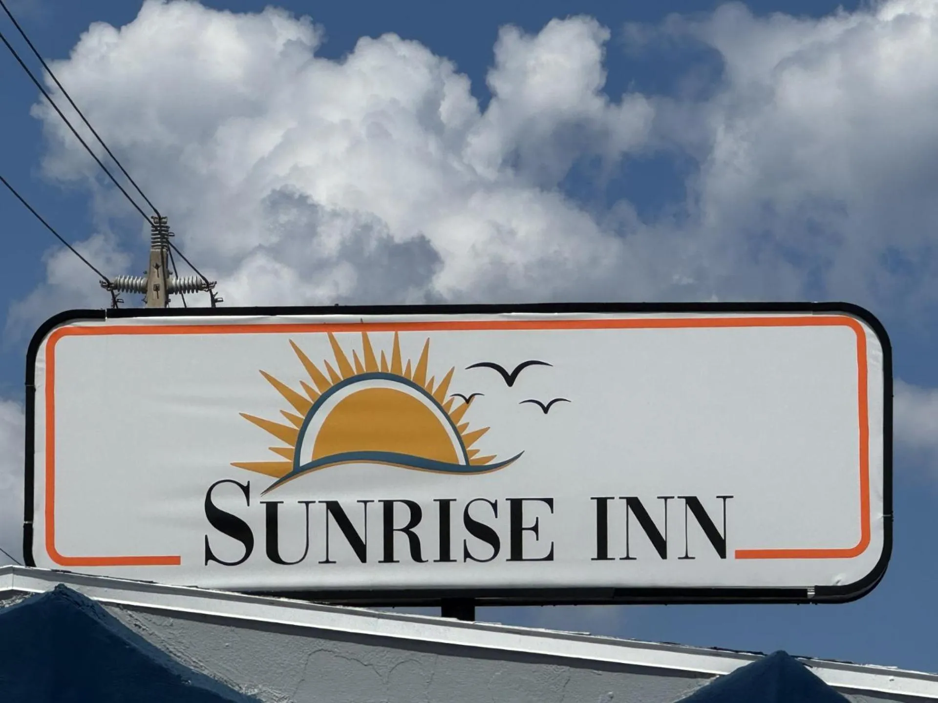 Property building in Sunrise Inn by OYO Titusville FL