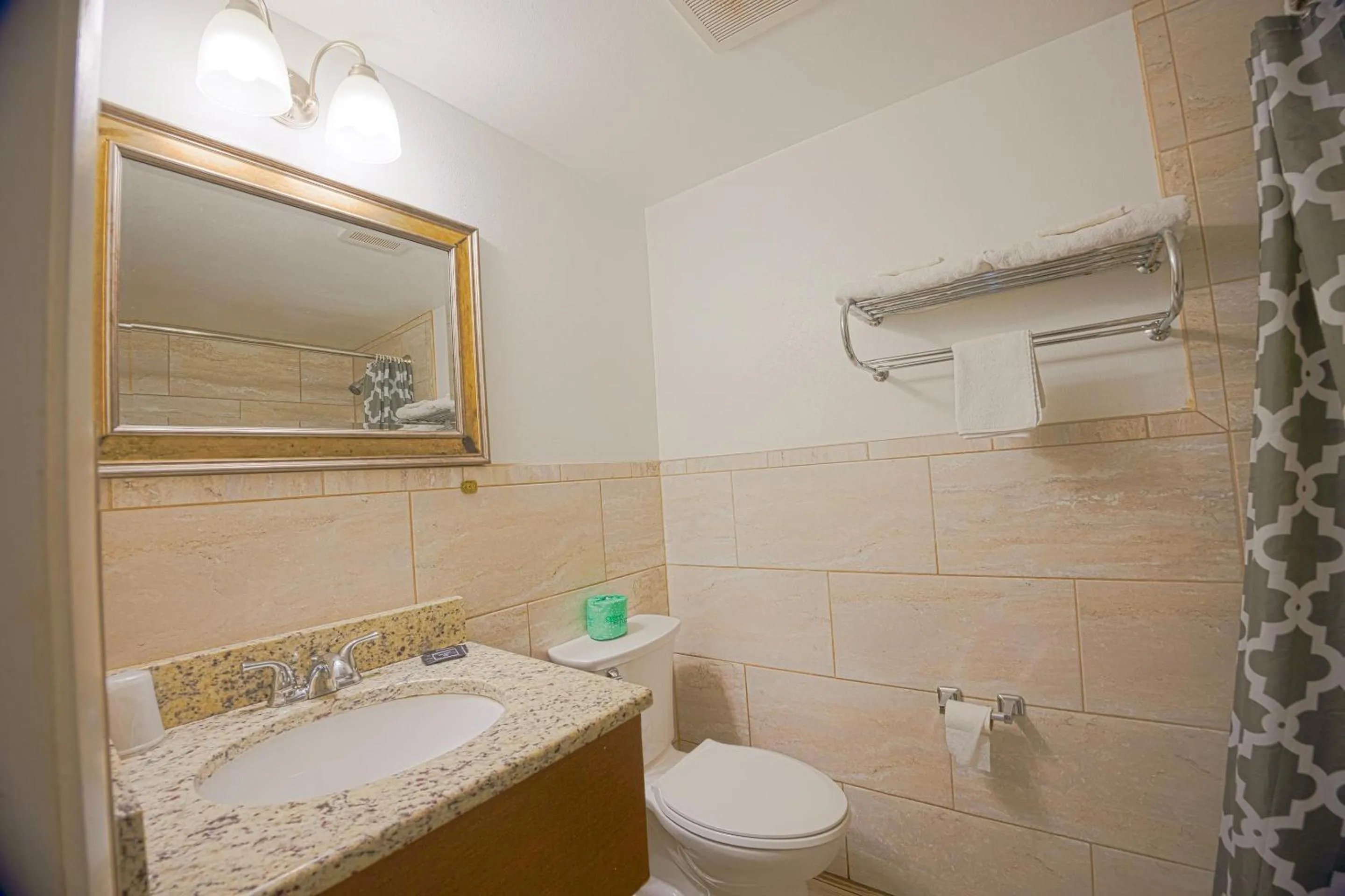 Bathroom in Sunrise Inn by OYO Titusville FL